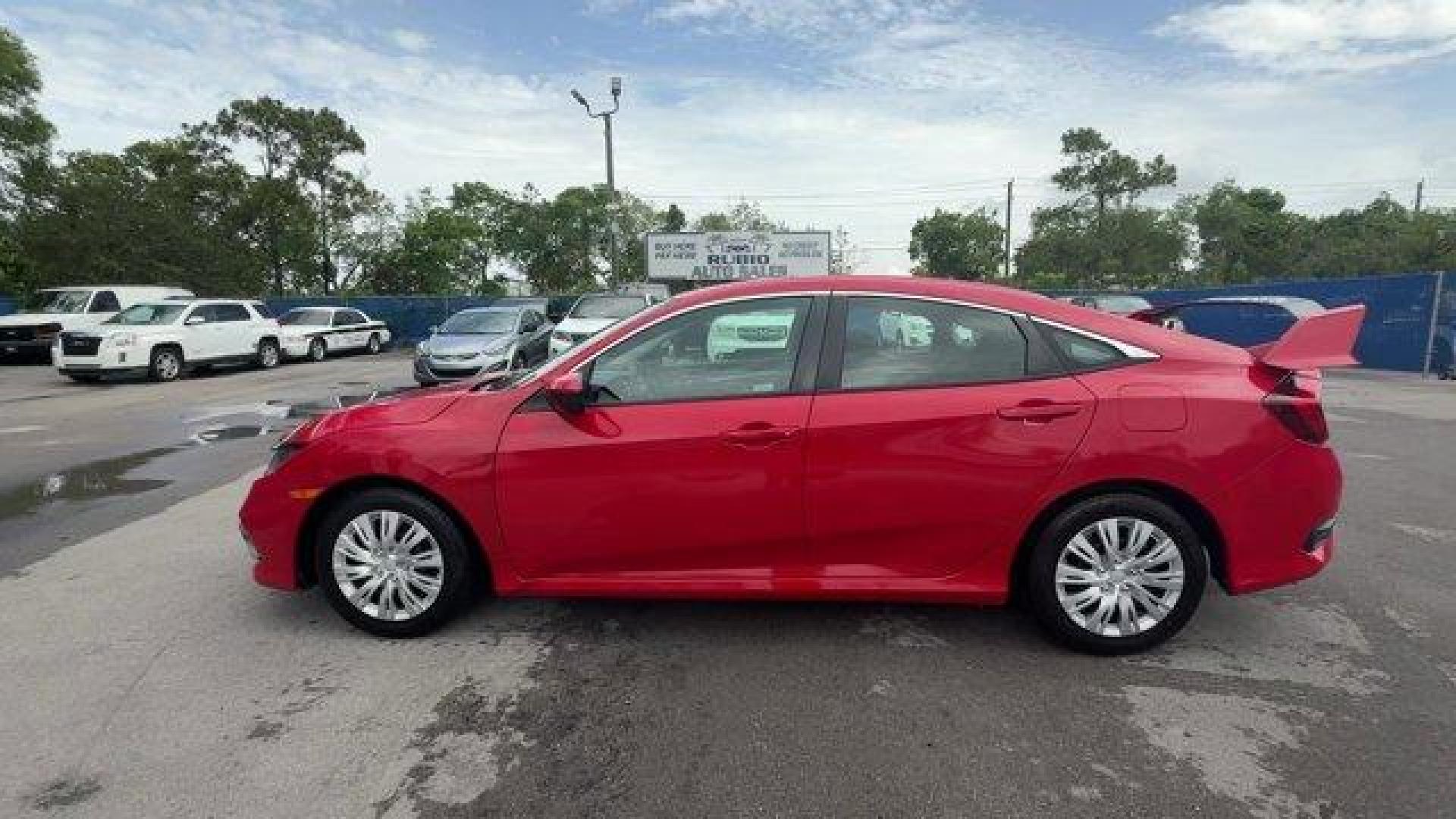 2019 Red Honda Civic Sedan LX (2HGFC2F66KH) with an 4 2.0 L engine, Variable transmission, located at 27610 S Dixie Hwy, Homestead, FL, 33032, (305) 749-2348, 25.510241, -80.438301 - Only 43,117 Miles! Delivers 38 Highway MPG and 30 City MPG! This Honda Civic Sedan delivers a Regular Unleaded I-4 2.0 L/122 engine powering this Variable transmission. Window Grid Antenna, Wheels: 16 w/Full Covers, VSA Electronic Stability Control (ESC).*This Honda Civic Sedan Comes Equipped with T - Photo#1