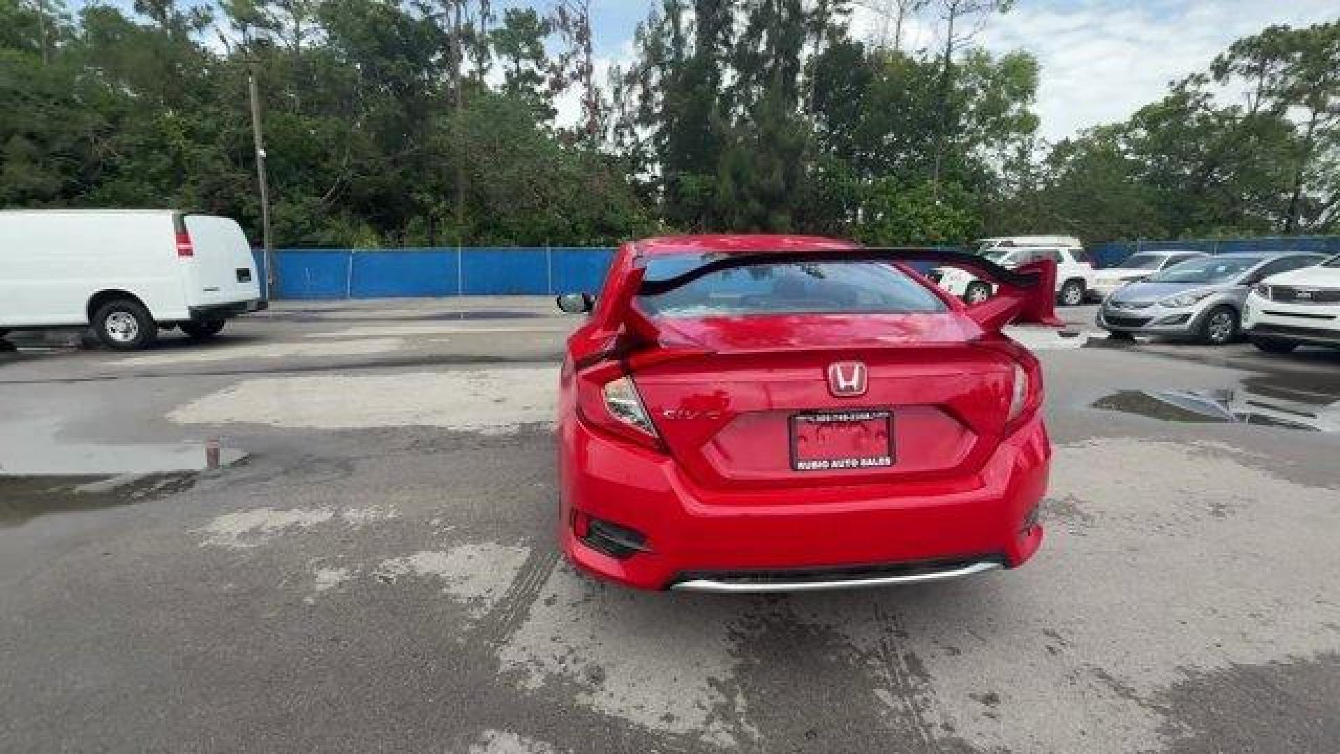 2019 Red Honda Civic Sedan LX (2HGFC2F66KH) with an 4 2.0 L engine, Variable transmission, located at 27610 S Dixie Hwy, Homestead, FL, 33032, (305) 749-2348, 25.510241, -80.438301 - Only 43,117 Miles! Delivers 38 Highway MPG and 30 City MPG! This Honda Civic Sedan delivers a Regular Unleaded I-4 2.0 L/122 engine powering this Variable transmission. Window Grid Antenna, Wheels: 16 w/Full Covers, VSA Electronic Stability Control (ESC).*This Honda Civic Sedan Comes Equipped with T - Photo#3
