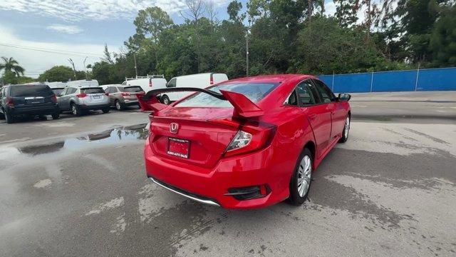 2019 Red Honda Civic Sedan LX (2HGFC2F66KH) with an 4 2.0 L engine, Variable transmission, located at 27610 S Dixie Hwy, Homestead, FL, 33032, (305) 749-2348, 25.510241, -80.438301 - Only 43,117 Miles! Delivers 38 Highway MPG and 30 City MPG! This Honda Civic Sedan delivers a Regular Unleaded I-4 2.0 L/122 engine powering this Variable transmission. Window Grid Antenna, Wheels: 16 w/Full Covers, VSA Electronic Stability Control (ESC).*This Honda Civic Sedan Comes Equipped with T - Photo#4