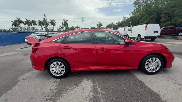 2019 Red Honda Civic Sedan LX (2HGFC2F66KH) with an 4 2.0 L engine, Variable transmission, located at 27610 S Dixie Hwy, Homestead, FL, 33032, (305) 749-2348, 25.510241, -80.438301 - Only 43,117 Miles! Delivers 38 Highway MPG and 30 City MPG! This Honda Civic Sedan delivers a Regular Unleaded I-4 2.0 L/122 engine powering this Variable transmission. Window Grid Antenna, Wheels: 16 w/Full Covers, VSA Electronic Stability Control (ESC).*This Honda Civic Sedan Comes Equipped with T - Photo#5