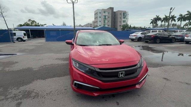 2019 Red Honda Civic Sedan LX (2HGFC2F66KH) with an 4 2.0 L engine, Variable transmission, located at 27610 S Dixie Hwy, Homestead, FL, 33032, (305) 749-2348, 25.510241, -80.438301 - Only 43,117 Miles! Delivers 38 Highway MPG and 30 City MPG! This Honda Civic Sedan delivers a Regular Unleaded I-4 2.0 L/122 engine powering this Variable transmission. Window Grid Antenna, Wheels: 16 w/Full Covers, VSA Electronic Stability Control (ESC).*This Honda Civic Sedan Comes Equipped with T - Photo#7