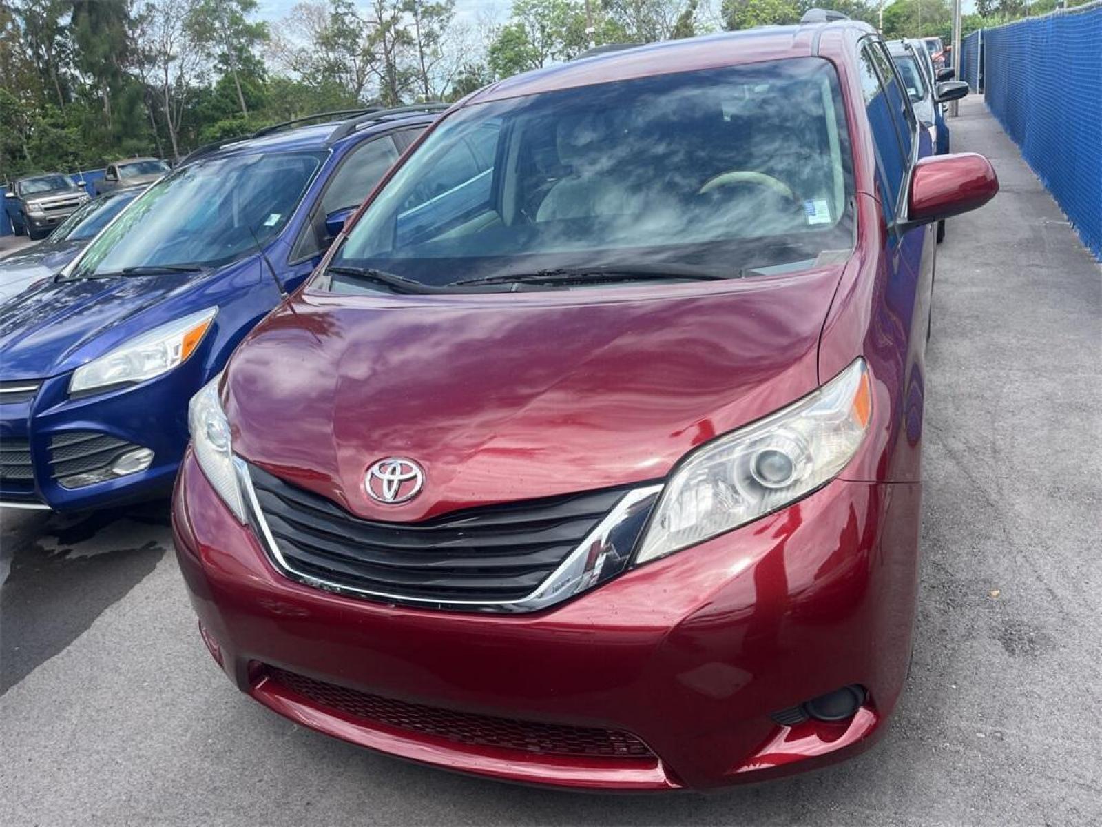 2011 Salsa Red Pearl Toyota Sienna Base (5TDKK3DC2BS) with an 3.5L V6 SMPI DOHC engine, Automatic transmission, located at 27610 S Dixie Hwy, Homestead, FL, 33032, (305) 749-2348, 25.510241, -80.438301 - Photo #0