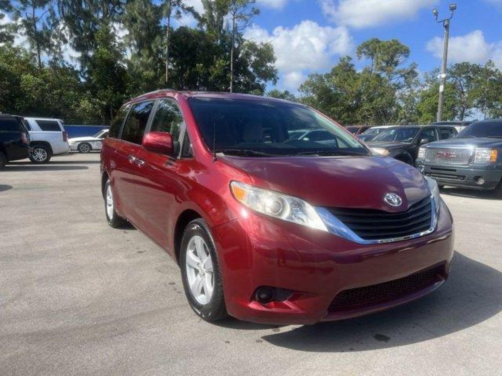 2011 Red Toyota Sienna Base (5TDKK3DC2BS) with an 6 3.5L engine, Automatic transmission, located at 27610 S Dixie Hwy, Homestead, FL, 33032, (305) 749-2348, 25.510241, -80.438301 - IIHS Top Safety Pick. Only 81,190 Miles! Scores 24 Highway MPG and 18 City MPG! This Toyota Sienna boasts a Gas V6 3.5L/211 engine powering this Automatic transmission. XM satellite radio (subscription required), Washer-linked variable intermittent wipers -inc: de-icer grid, Vehicle stability contro - Photo #0