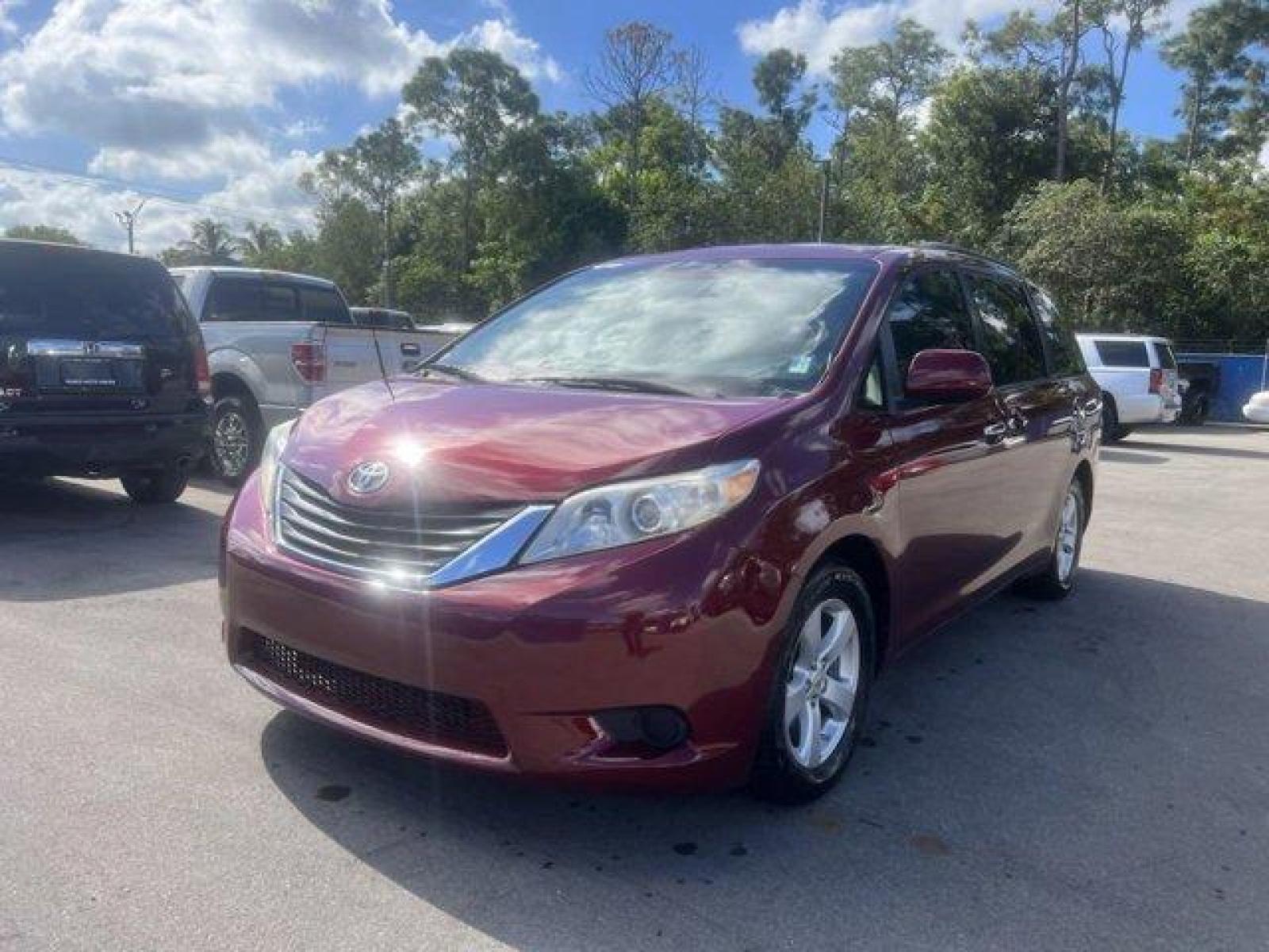 2011 Red Toyota Sienna Base (5TDKK3DC2BS) with an 6 3.5L engine, Automatic transmission, located at 27610 S Dixie Hwy, Homestead, FL, 33032, (305) 749-2348, 25.510241, -80.438301 - IIHS Top Safety Pick. Only 81,190 Miles! Scores 24 Highway MPG and 18 City MPG! This Toyota Sienna boasts a Gas V6 3.5L/211 engine powering this Automatic transmission. XM satellite radio (subscription required), Washer-linked variable intermittent wipers -inc: de-icer grid, Vehicle stability contro - Photo #1