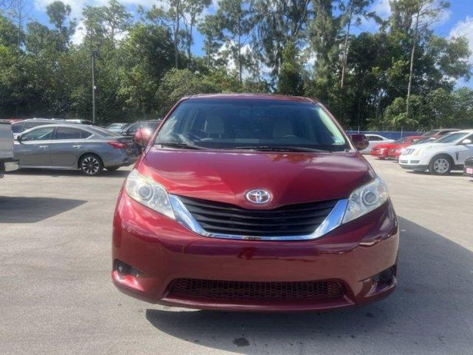 2011 Red Toyota Sienna Base (5TDKK3DC2BS) with an 6 3.5L engine, Automatic transmission, located at 27610 S Dixie Hwy, Homestead, FL, 33032, (305) 749-2348, 25.510241, -80.438301 - IIHS Top Safety Pick. Only 81,190 Miles! Scores 24 Highway MPG and 18 City MPG! This Toyota Sienna boasts a Gas V6 3.5L/211 engine powering this Automatic transmission. XM satellite radio (subscription required), Washer-linked variable intermittent wipers -inc: de-icer grid, Vehicle stability contro - Photo #2