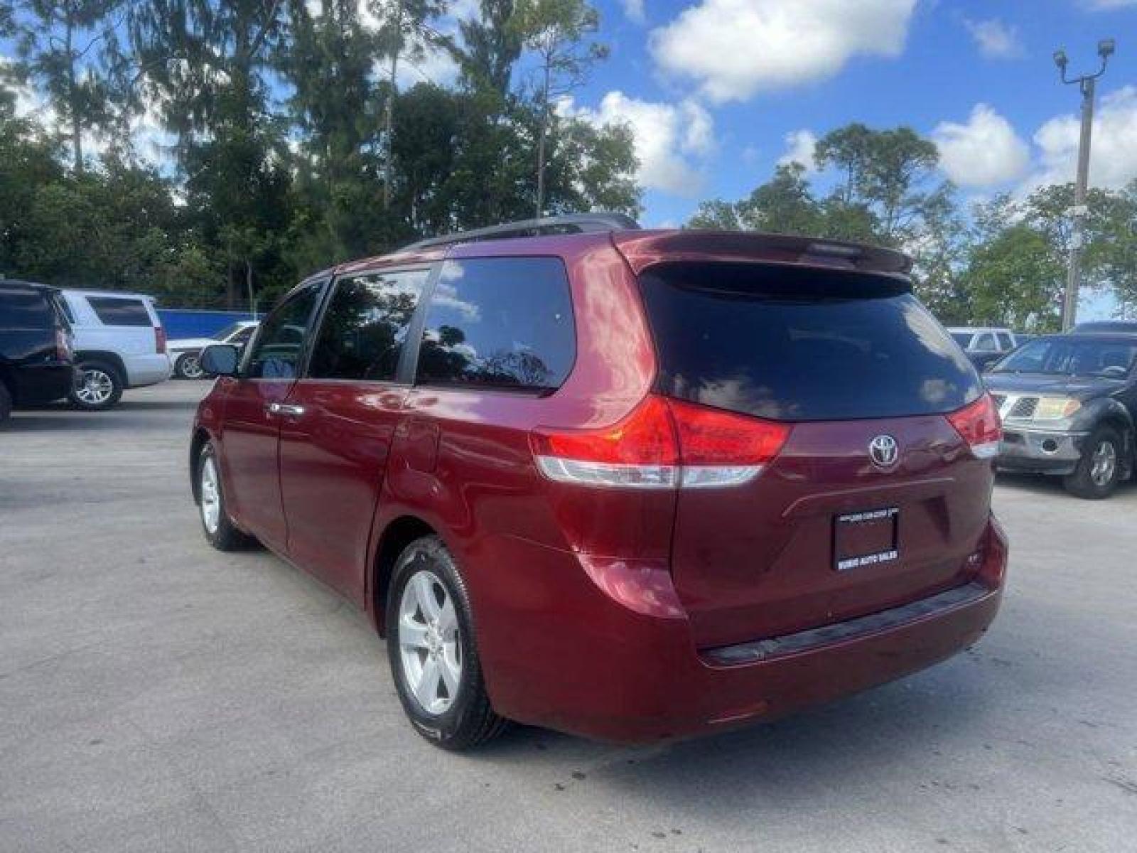 2011 Red Toyota Sienna Base (5TDKK3DC2BS) with an 6 3.5L engine, Automatic transmission, located at 27610 S Dixie Hwy, Homestead, FL, 33032, (305) 749-2348, 25.510241, -80.438301 - IIHS Top Safety Pick. Only 81,190 Miles! Scores 24 Highway MPG and 18 City MPG! This Toyota Sienna boasts a Gas V6 3.5L/211 engine powering this Automatic transmission. XM satellite radio (subscription required), Washer-linked variable intermittent wipers -inc: de-icer grid, Vehicle stability contro - Photo #3