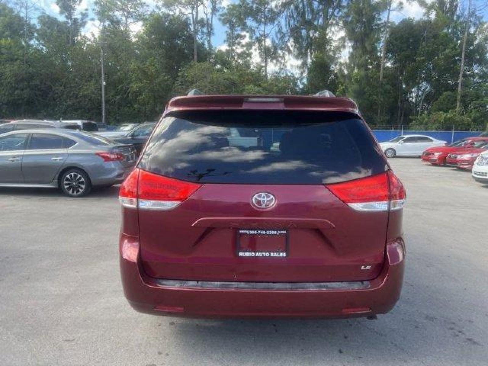 2011 Red Toyota Sienna Base (5TDKK3DC2BS) with an 6 3.5L engine, Automatic transmission, located at 27610 S Dixie Hwy, Homestead, FL, 33032, (305) 749-2348, 25.510241, -80.438301 - IIHS Top Safety Pick. Only 81,190 Miles! Scores 24 Highway MPG and 18 City MPG! This Toyota Sienna boasts a Gas V6 3.5L/211 engine powering this Automatic transmission. XM satellite radio (subscription required), Washer-linked variable intermittent wipers -inc: de-icer grid, Vehicle stability contro - Photo #4