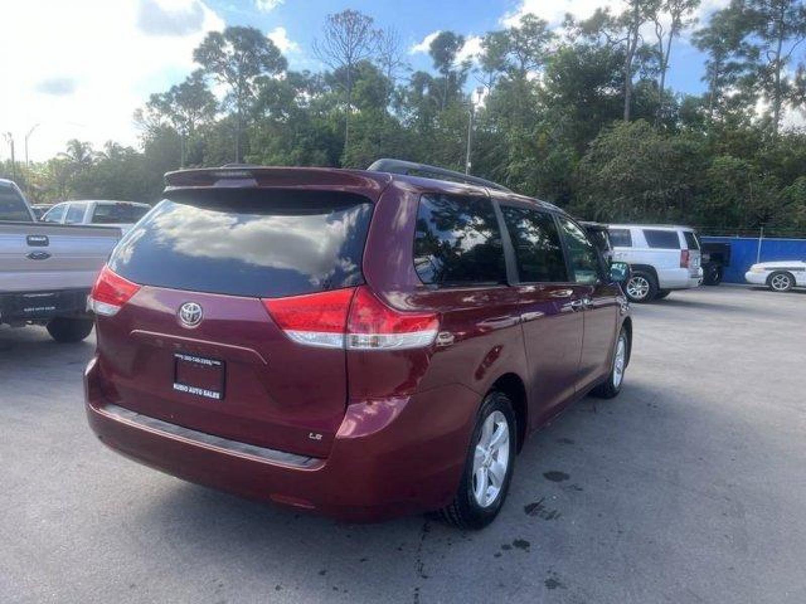2011 Red Toyota Sienna Base (5TDKK3DC2BS) with an 6 3.5L engine, Automatic transmission, located at 27610 S Dixie Hwy, Homestead, FL, 33032, (305) 749-2348, 25.510241, -80.438301 - IIHS Top Safety Pick. Only 81,190 Miles! Scores 24 Highway MPG and 18 City MPG! This Toyota Sienna boasts a Gas V6 3.5L/211 engine powering this Automatic transmission. XM satellite radio (subscription required), Washer-linked variable intermittent wipers -inc: de-icer grid, Vehicle stability contro - Photo #5