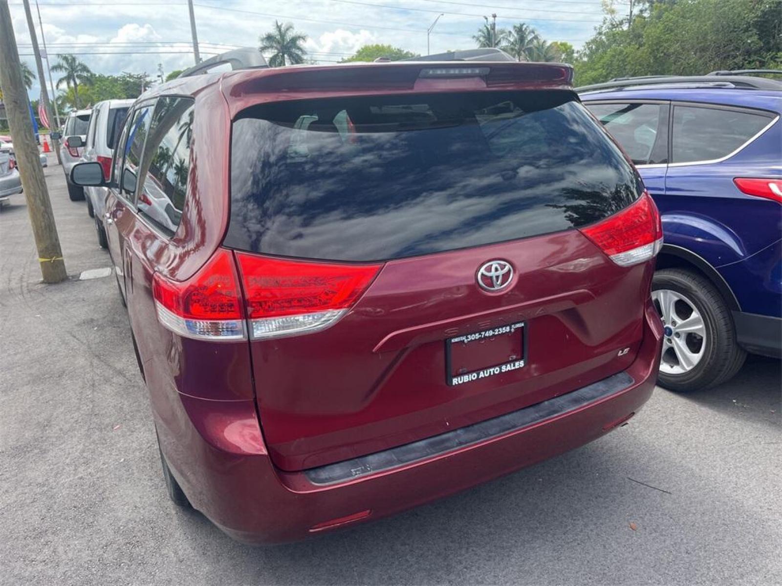 2011 Salsa Red Pearl Toyota Sienna Base (5TDKK3DC2BS) with an 3.5L V6 SMPI DOHC engine, Automatic transmission, located at 27610 S Dixie Hwy, Homestead, FL, 33032, (305) 749-2348, 25.510241, -80.438301 - Photo #3