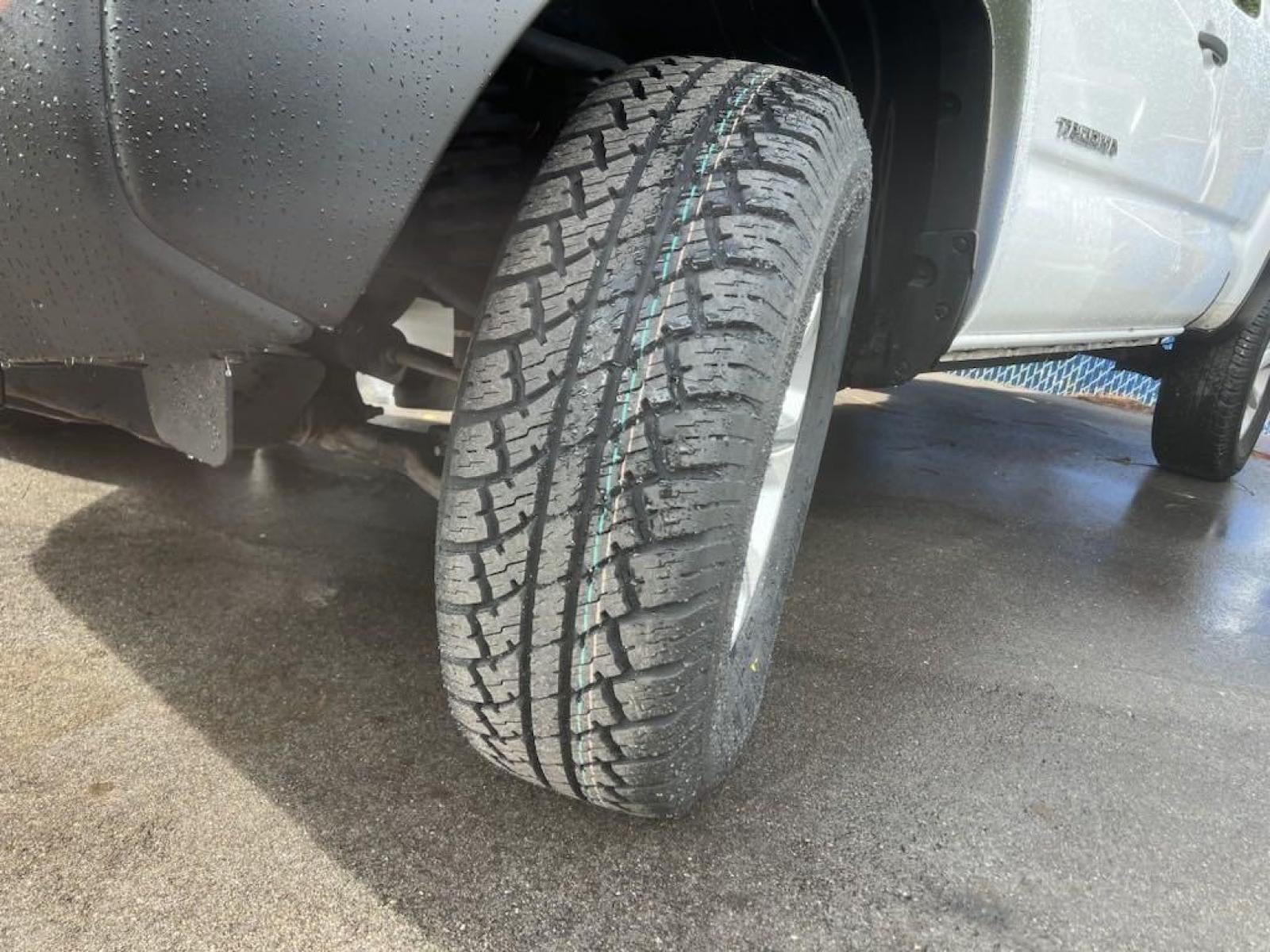 2014 Super White /Graphite Toyota Tacoma PreRunner (5TFTX4GN0EX) with an 2.7L I4 DOHC 16V engine, Automatic transmission, located at 27610 S Dixie Hwy, Homestead, FL, 33032, (305) 749-2348, 25.510241, -80.438301 - Photo #17