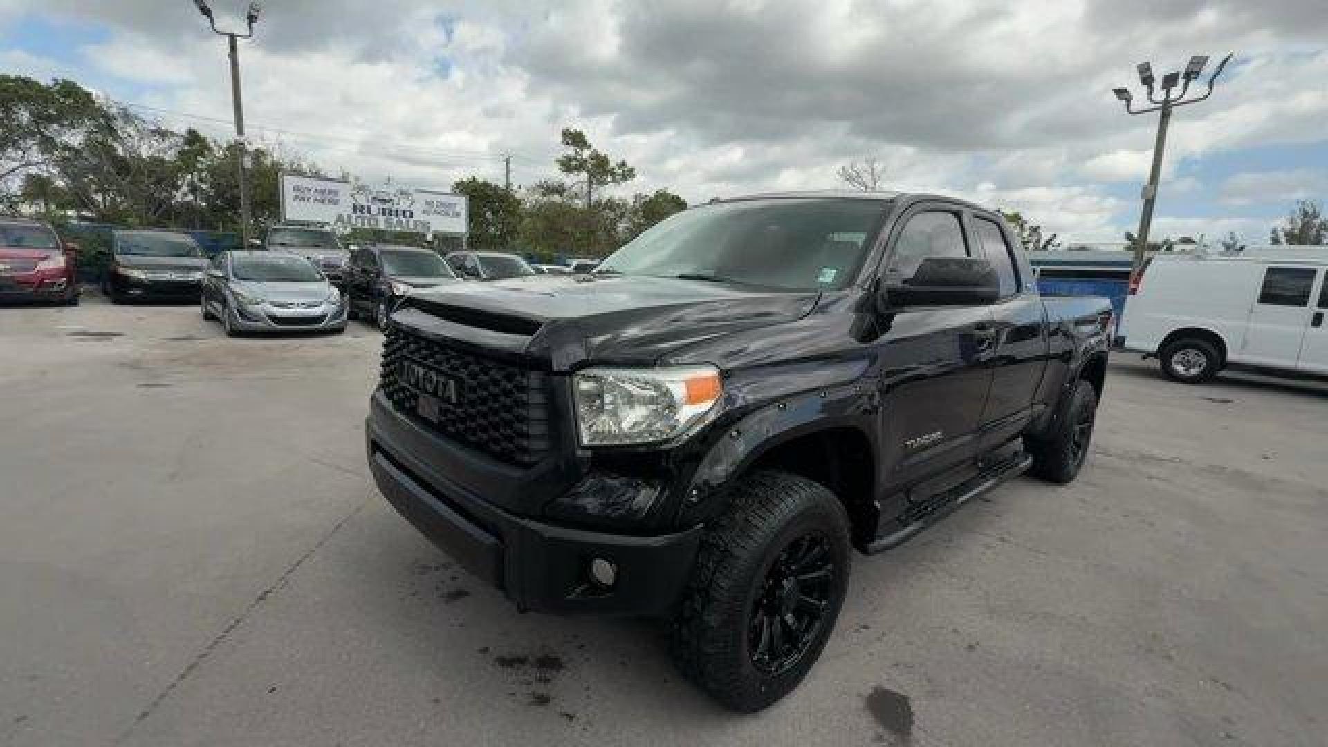 2015 Black Toyota Tundra 2WD Truck SR5 (5TFRM5F14FX) with an 8 4.6 L engine, Automatic transmission, located at 27610 S Dixie Hwy, Homestead, FL, 33032, (305) 749-2348, 25.510241, -80.438301 - Only 119,485 Miles! Boasts 19 Highway MPG and 15 City MPG! This Toyota Tundra 2WD Truck delivers a Regular Unleaded V-8 4.6 L/281 engine powering this Automatic transmission. Wheels: 18 x 8J Styled Steel, Variable Intermittent Wipers w/Heated Wiper Park, Urethane Gear Shifter Material.* This Toyota - Photo#0