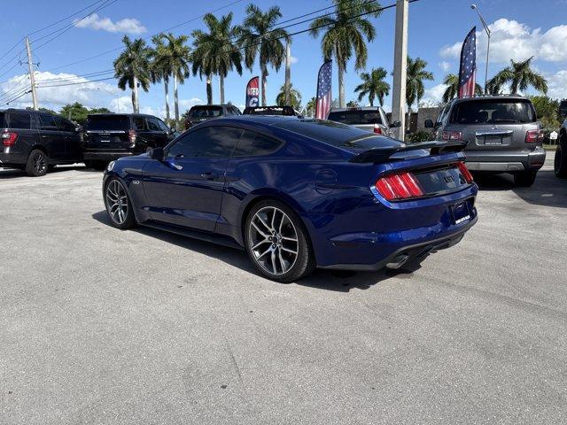 2015 Blue Ford Mustang GT Premium (1FA6P8CFXF5) with an 8 5.0 L engine, Automatic transmission, located at 27610 S Dixie Hwy, Homestead, FL, 33032, (305) 749-2348, 25.510241, -80.438301 - KBB.com Best Buy Awards Finalist. Only 92,923 Miles! Scores 25 Highway MPG and 15 City MPG! This Ford Mustang boasts a Premium Unleaded V-8 5.0 L/302 engine powering this Automatic transmission. Wheels: 18 x 8 Magnetic Painted/Machined -inc: Aluminum, Trunk Rear Cargo Access, Trip Computer.*This For - Photo#2