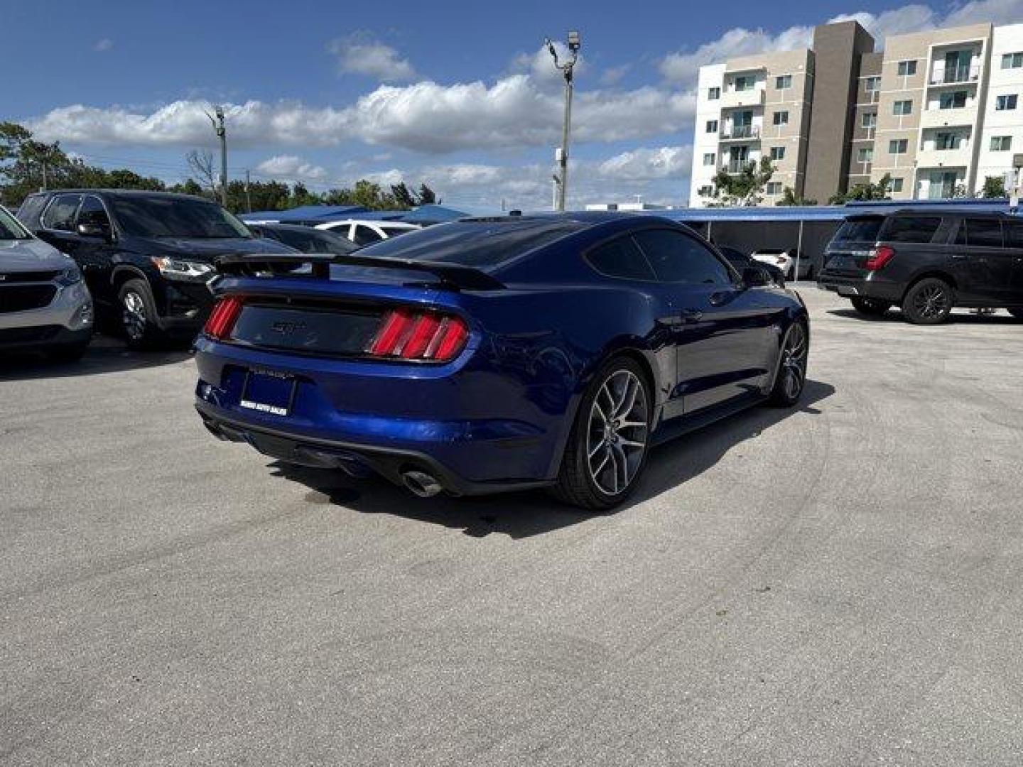 2015 Blue Ford Mustang GT Premium (1FA6P8CFXF5) with an 8 5.0 L engine, Automatic transmission, located at 27610 S Dixie Hwy, Homestead, FL, 33032, (305) 749-2348, 25.510241, -80.438301 - KBB.com Best Buy Awards Finalist. Only 92,923 Miles! Scores 25 Highway MPG and 15 City MPG! This Ford Mustang boasts a Premium Unleaded V-8 5.0 L/302 engine powering this Automatic transmission. Wheels: 18 x 8 Magnetic Painted/Machined -inc: Aluminum, Trunk Rear Cargo Access, Trip Computer.*This For - Photo#4