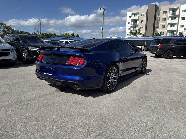 2015 Blue Ford Mustang GT Premium (1FA6P8CFXF5) with an 8 5.0 L engine, Automatic transmission, located at 27610 S Dixie Hwy, Homestead, FL, 33032, (305) 749-2348, 25.510241, -80.438301 - KBB.com Best Buy Awards Finalist. Only 92,923 Miles! Scores 25 Highway MPG and 15 City MPG! This Ford Mustang boasts a Premium Unleaded V-8 5.0 L/302 engine powering this Automatic transmission. Wheels: 18 x 8 Magnetic Painted/Machined -inc: Aluminum, Trunk Rear Cargo Access, Trip Computer.*This For - Photo#4