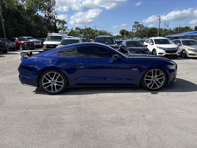 2015 Blue Ford Mustang GT Premium (1FA6P8CFXF5) with an 8 5.0 L engine, Automatic transmission, located at 27610 S Dixie Hwy, Homestead, FL, 33032, (305) 749-2348, 25.510241, -80.438301 - KBB.com Best Buy Awards Finalist. Only 92,923 Miles! Scores 25 Highway MPG and 15 City MPG! This Ford Mustang boasts a Premium Unleaded V-8 5.0 L/302 engine powering this Automatic transmission. Wheels: 18 x 8 Magnetic Painted/Machined -inc: Aluminum, Trunk Rear Cargo Access, Trip Computer.*This For - Photo#5