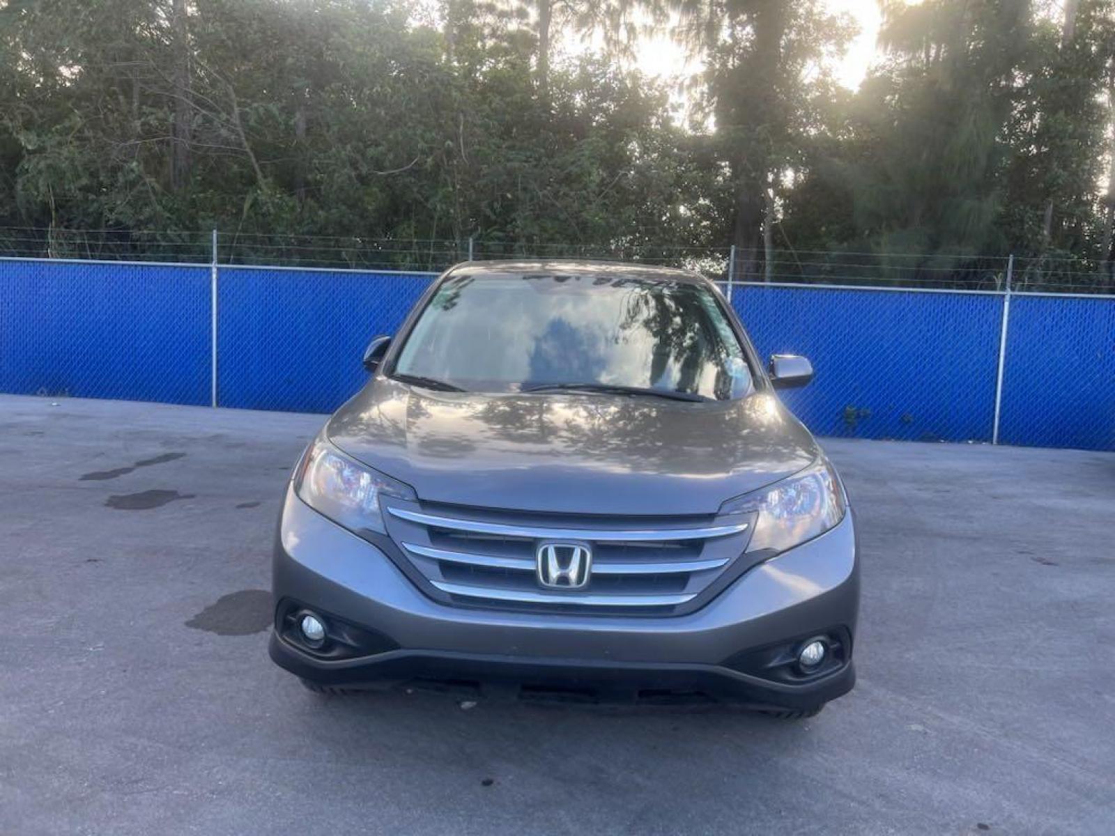 2012 Gray /Gray Honda CR-V EX (JHLRM4H50CC) with an 2.4L I4 DOHC 16V i-VTEC engine, Automatic transmission, located at 27610 S Dixie Hwy, Homestead, FL, 33032, (305) 749-2348, 25.510241, -80.438301 - Photo #1
