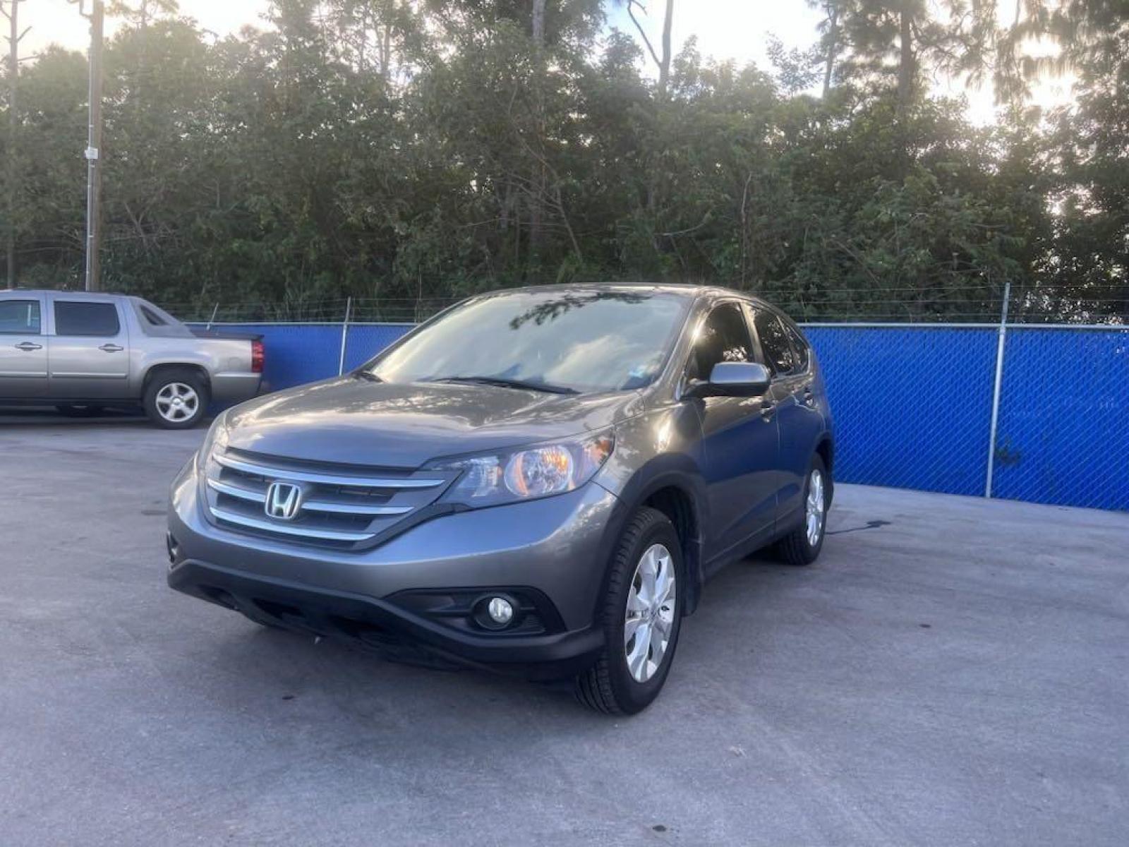 2012 Gray /Gray Honda CR-V EX (JHLRM4H50CC) with an 2.4L I4 DOHC 16V i-VTEC engine, Automatic transmission, located at 27610 S Dixie Hwy, Homestead, FL, 33032, (305) 749-2348, 25.510241, -80.438301 - Photo #2
