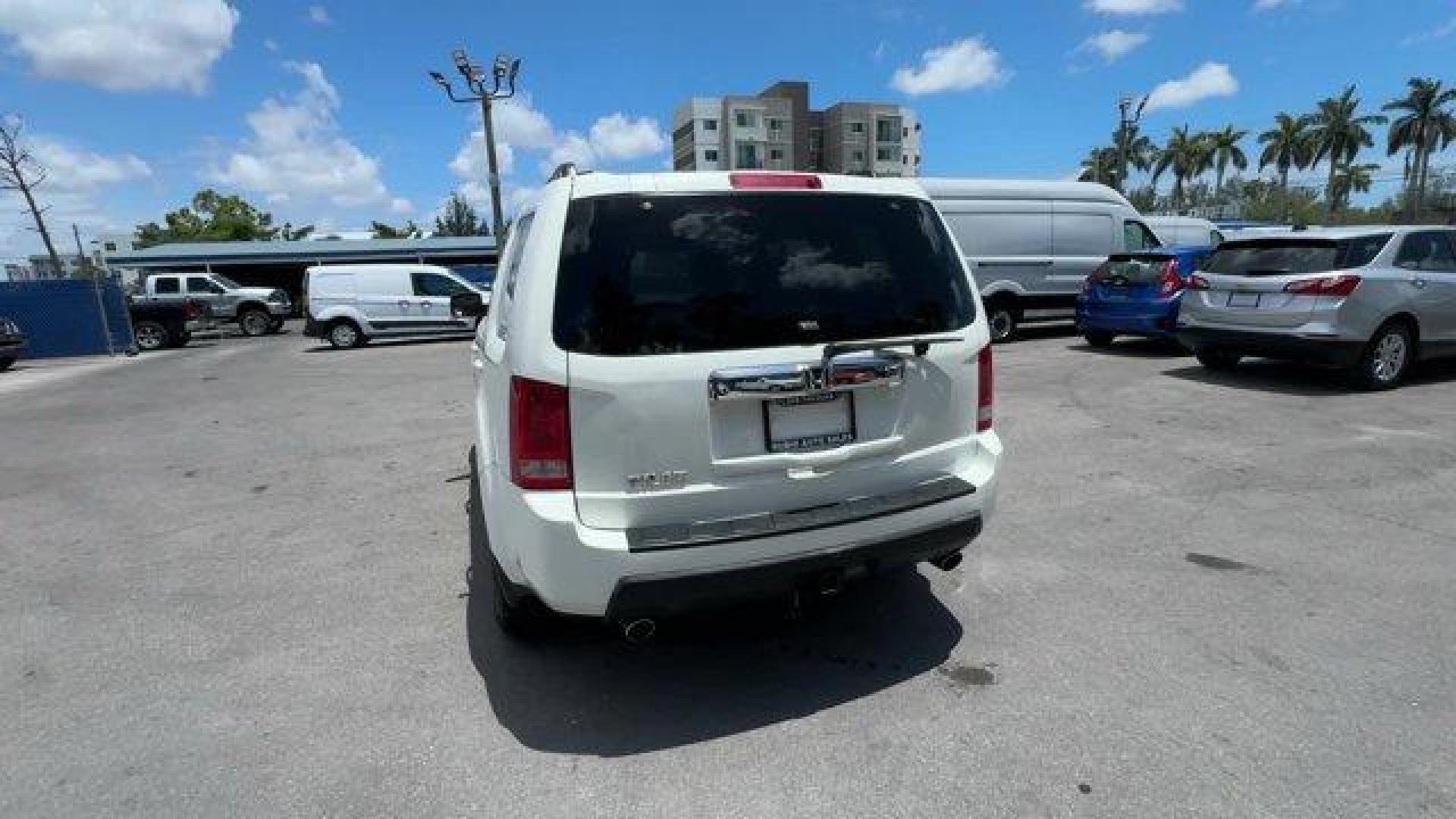 2011 White Honda Pilot EX-L (5FNYF3H56BB) with an 6 3.5L engine, Automatic transmission, located at 27610 S Dixie Hwy, Homestead, FL, 33032, (305) 749-2348, 25.510241, -80.438301 - KBB.com 10 Best Used Family Cars Under $15,000. Only 139,009 Miles! Boasts 23 Highway MPG and 17 City MPG! This Honda Pilot delivers a Gas V6 3.5L/212 engine powering this Automatic transmission. XM satellite radio (subscription required), Warning lights -inc: low-fuel, low-oil pressure, door/tailga - Photo#3