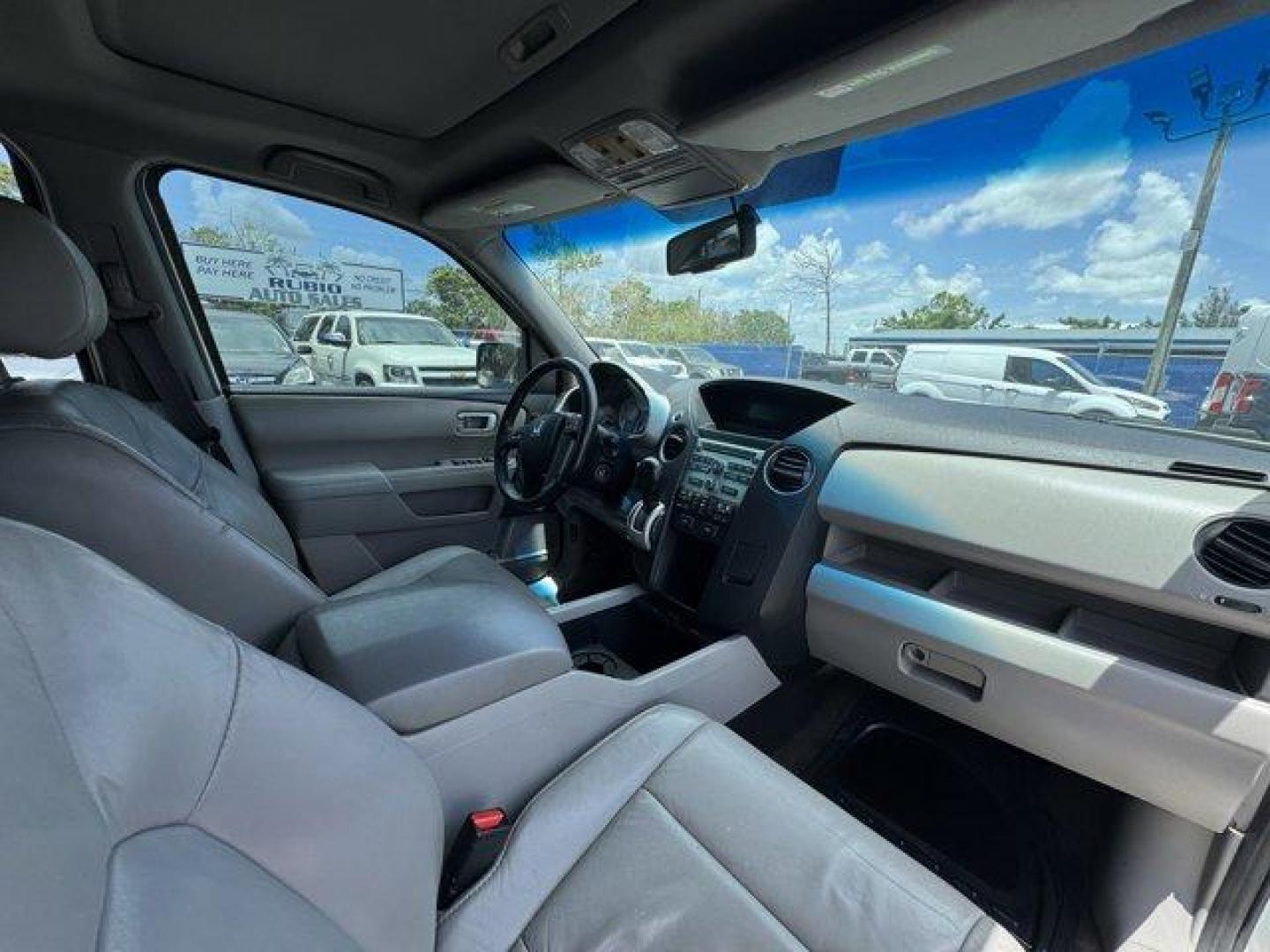 2011 White Honda Pilot EX-L (5FNYF3H56BB) with an 6 3.5L engine, Automatic transmission, located at 27610 S Dixie Hwy, Homestead, FL, 33032, (305) 749-2348, 25.510241, -80.438301 - KBB.com 10 Best Used Family Cars Under $15,000. Only 139,009 Miles! Boasts 23 Highway MPG and 17 City MPG! This Honda Pilot delivers a Gas V6 3.5L/212 engine powering this Automatic transmission. XM satellite radio (subscription required), Warning lights -inc: low-fuel, low-oil pressure, door/tailga - Photo#10