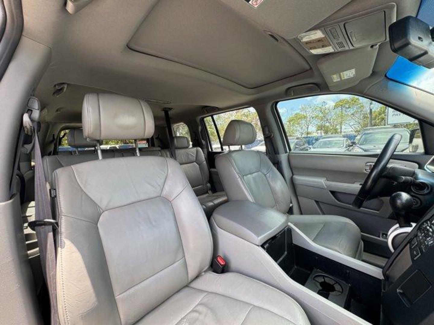 2011 White Honda Pilot EX-L (5FNYF3H56BB) with an 6 3.5L engine, Automatic transmission, located at 27610 S Dixie Hwy, Homestead, FL, 33032, (305) 749-2348, 25.510241, -80.438301 - KBB.com 10 Best Used Family Cars Under $15,000. Only 139,009 Miles! Boasts 23 Highway MPG and 17 City MPG! This Honda Pilot delivers a Gas V6 3.5L/212 engine powering this Automatic transmission. XM satellite radio (subscription required), Warning lights -inc: low-fuel, low-oil pressure, door/tailga - Photo#11