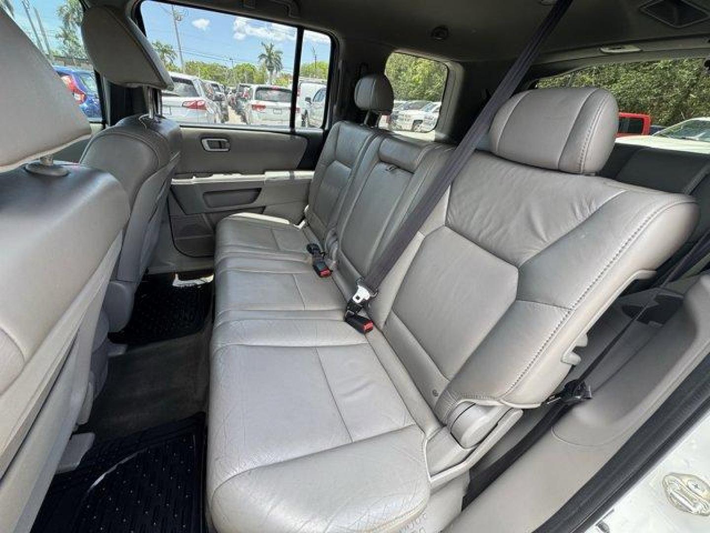 2011 White Honda Pilot EX-L (5FNYF3H56BB) with an 6 3.5L engine, Automatic transmission, located at 27610 S Dixie Hwy, Homestead, FL, 33032, (305) 749-2348, 25.510241, -80.438301 - KBB.com 10 Best Used Family Cars Under $15,000. Only 139,009 Miles! Boasts 23 Highway MPG and 17 City MPG! This Honda Pilot delivers a Gas V6 3.5L/212 engine powering this Automatic transmission. XM satellite radio (subscription required), Warning lights -inc: low-fuel, low-oil pressure, door/tailga - Photo#12
