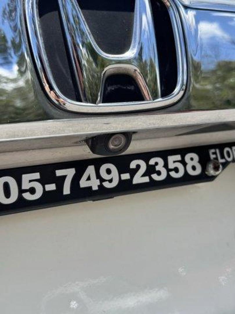 2011 White Honda Pilot EX-L (5FNYF3H56BB) with an 6 3.5L engine, Automatic transmission, located at 27610 S Dixie Hwy, Homestead, FL, 33032, (305) 749-2348, 25.510241, -80.438301 - KBB.com 10 Best Used Family Cars Under $15,000. Only 139,009 Miles! Boasts 23 Highway MPG and 17 City MPG! This Honda Pilot delivers a Gas V6 3.5L/212 engine powering this Automatic transmission. XM satellite radio (subscription required), Warning lights -inc: low-fuel, low-oil pressure, door/tailga - Photo#19