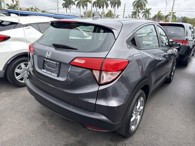 2018 Gray Honda HR-V LX 2WD CVT (3CZRU5H39JG) with an 4 1.8 L engine, Variable transmission, located at 27610 S Dixie Hwy, Homestead, FL, 33032, (305) 749-2348, 25.510241, -80.438301 - KBB.com 10 Most Awarded Brands. Only 70,359 Miles! Boasts 34 Highway MPG and 28 City MPG! This Honda HR-V delivers a Regular Unleaded I-4 1.8 L/110 engine powering this Variable transmission. Wheels: 17 Machine-Finished Alloy w/Silver Insert, VSA Electronic Stability Control (ESC), Urethane Gear Shi - Photo#2