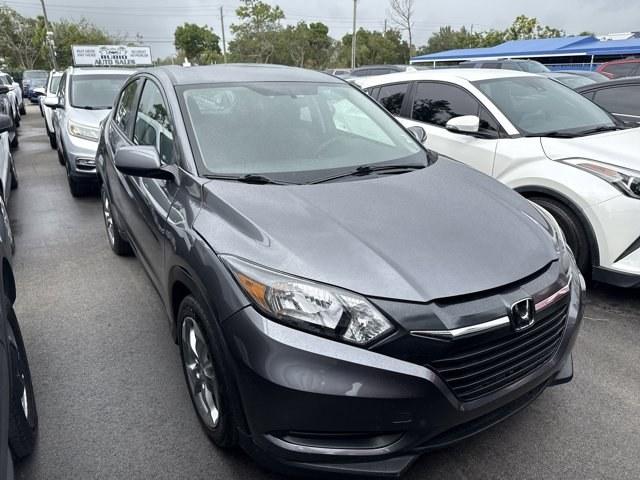 2018 Gray Honda HR-V LX 2WD CVT (3CZRU5H39JG) with an 4 1.8 L engine, Variable transmission, located at 27610 S Dixie Hwy, Homestead, FL, 33032, (305) 749-2348, 25.510241, -80.438301 - KBB.com 10 Most Awarded Brands. Only 70,359 Miles! Boasts 34 Highway MPG and 28 City MPG! This Honda HR-V delivers a Regular Unleaded I-4 1.8 L/110 engine powering this Variable transmission. Wheels: 17 Machine-Finished Alloy w/Silver Insert, VSA Electronic Stability Control (ESC), Urethane Gear Shi - Photo#3