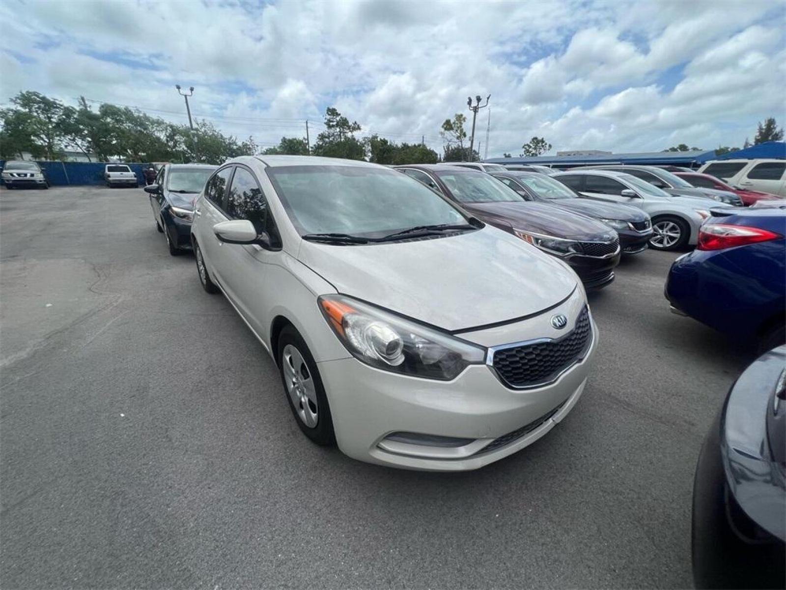 2015 Desert Sand /Gray Kia Forte LX (KNAFK4A60F5) with an 1.8L I4 DOHC Dual CVVT engine, Automatic transmission, located at 27610 S Dixie Hwy, Homestead, FL, 33032, (305) 749-2348, 25.510241, -80.438301 - Photo #1
