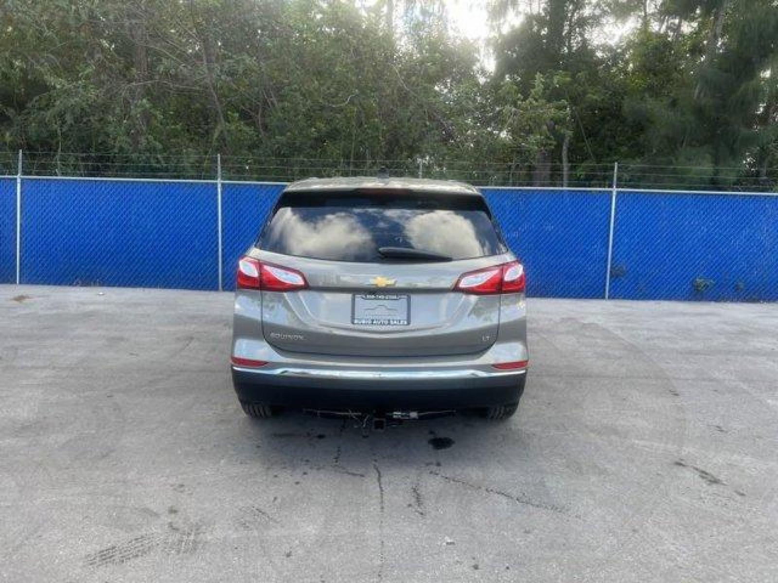 2018 Pepperdust Metallic /Jet Black Chevrolet Equinox LT (3GNAXJEV2JS) with an 4 1.5L engine, Automatic transmission, located at 27610 S Dixie Hwy, Homestead, FL, 33032, (305) 749-2348, 25.510241, -80.438301 - KBB.com 10 Best SUVs Under $25,000. Only 60,413 Miles! Boasts 32 Highway MPG and 26 City MPG! This Chevrolet Equinox boasts a Turbocharged Gas I4 1.5L/ engine powering this Automatic transmission. WHEELS, 17 (43.2 CM) ALUMINUM (STD), UNIVERSAL HOME REMOTE includes garage door opener, programmable, T - Photo #3