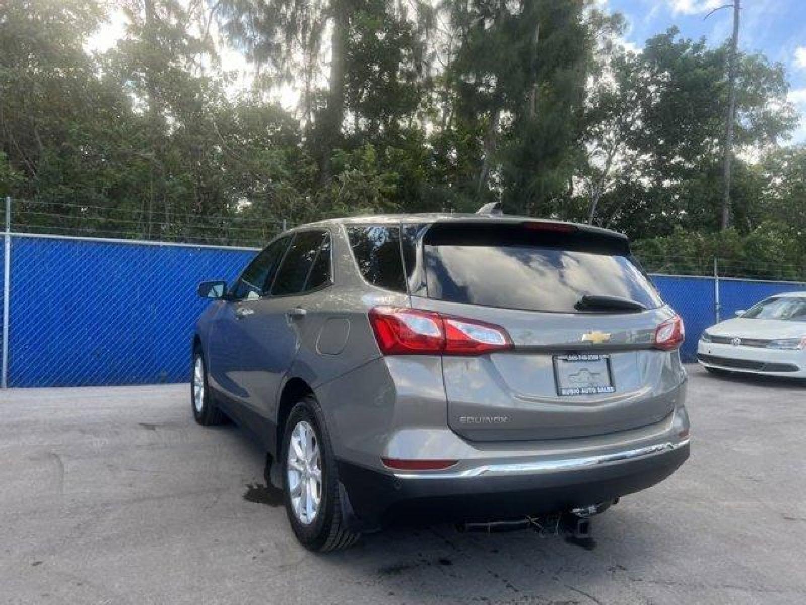 2018 Pepperdust Metallic /Jet Black Chevrolet Equinox LT (3GNAXJEV2JS) with an 4 1.5L engine, Automatic transmission, located at 27610 S Dixie Hwy, Homestead, FL, 33032, (305) 749-2348, 25.510241, -80.438301 - KBB.com 10 Best SUVs Under $25,000. Only 60,413 Miles! Boasts 32 Highway MPG and 26 City MPG! This Chevrolet Equinox boasts a Turbocharged Gas I4 1.5L/ engine powering this Automatic transmission. WHEELS, 17 (43.2 CM) ALUMINUM (STD), UNIVERSAL HOME REMOTE includes garage door opener, programmable, T - Photo #4
