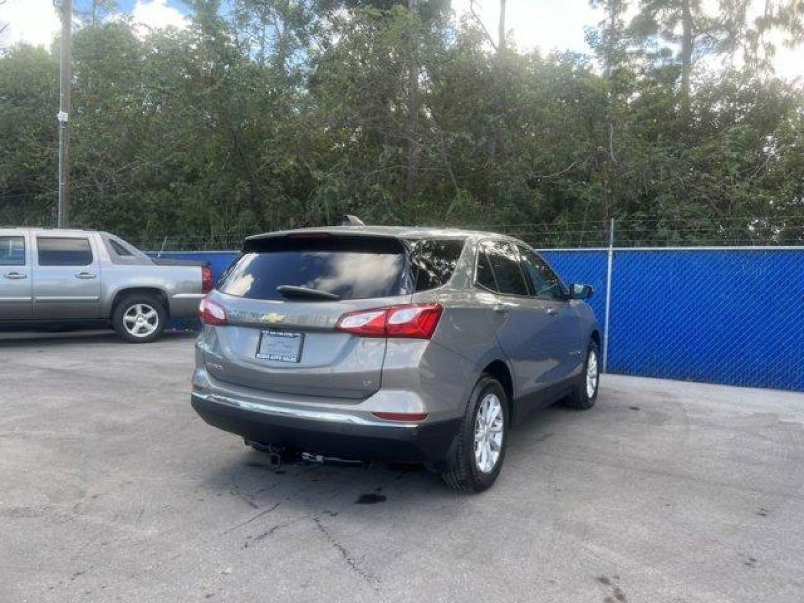 2018 Pepperdust Metallic /Jet Black Chevrolet Equinox LT (3GNAXJEV2JS) with an 4 1.5L engine, Automatic transmission, located at 27610 S Dixie Hwy, Homestead, FL, 33032, (305) 749-2348, 25.510241, -80.438301 - KBB.com 10 Best SUVs Under $25,000. Only 60,413 Miles! Boasts 32 Highway MPG and 26 City MPG! This Chevrolet Equinox boasts a Turbocharged Gas I4 1.5L/ engine powering this Automatic transmission. WHEELS, 17 (43.2 CM) ALUMINUM (STD), UNIVERSAL HOME REMOTE includes garage door opener, programmable, T - Photo #6
