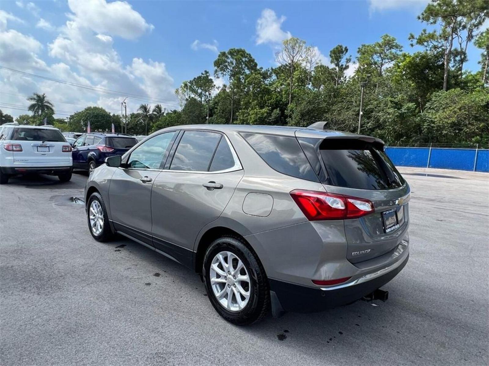 2018 Pepperdust Metallic /Jet Black Chevrolet Equinox LT (3GNAXJEV2JS) with an 1.5L DOHC engine, Automatic transmission, located at 27610 S Dixie Hwy, Homestead, FL, 33032, (305) 749-2348, 25.510241, -80.438301 - Photo #2