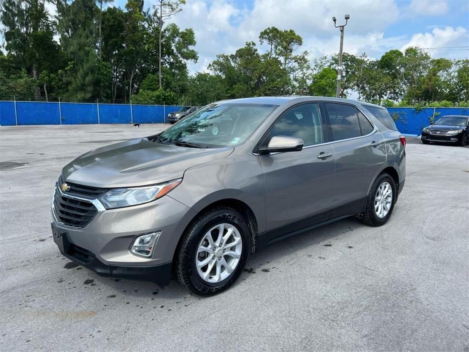 2018 Pepperdust Metallic /Jet Black Chevrolet Equinox LT (3GNAXJEV2JS) with an 1.5L DOHC engine, Automatic transmission, located at 27610 S Dixie Hwy, Homestead, FL, 33032, (305) 749-2348, 25.510241, -80.438301 - Photo #3
