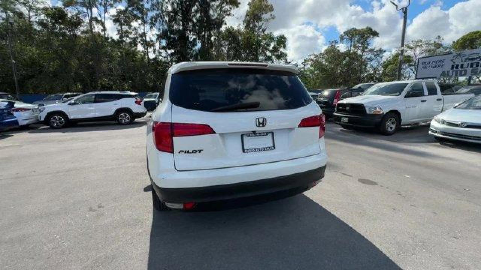 2016 White Honda Pilot EX-L (5FNYF5H57GB) with an 6 3.5 L engine, Automatic transmission, located at 27610 S Dixie Hwy, Homestead, FL, 33032, (305) 749-2348, 25.510241, -80.438301 - ALG Residual Value Awards, Residual Value Awards. Boasts 27 Highway MPG and 19 City MPG! This Honda Pilot boasts a Regular Unleaded V-6 3.5 L/212 engine powering this Automatic transmission. Window Grid Antenna, Wheels: 18 Alloy, Wheels w/Machined Accents.*This Honda Pilot Comes Equipped with These - Photo#3