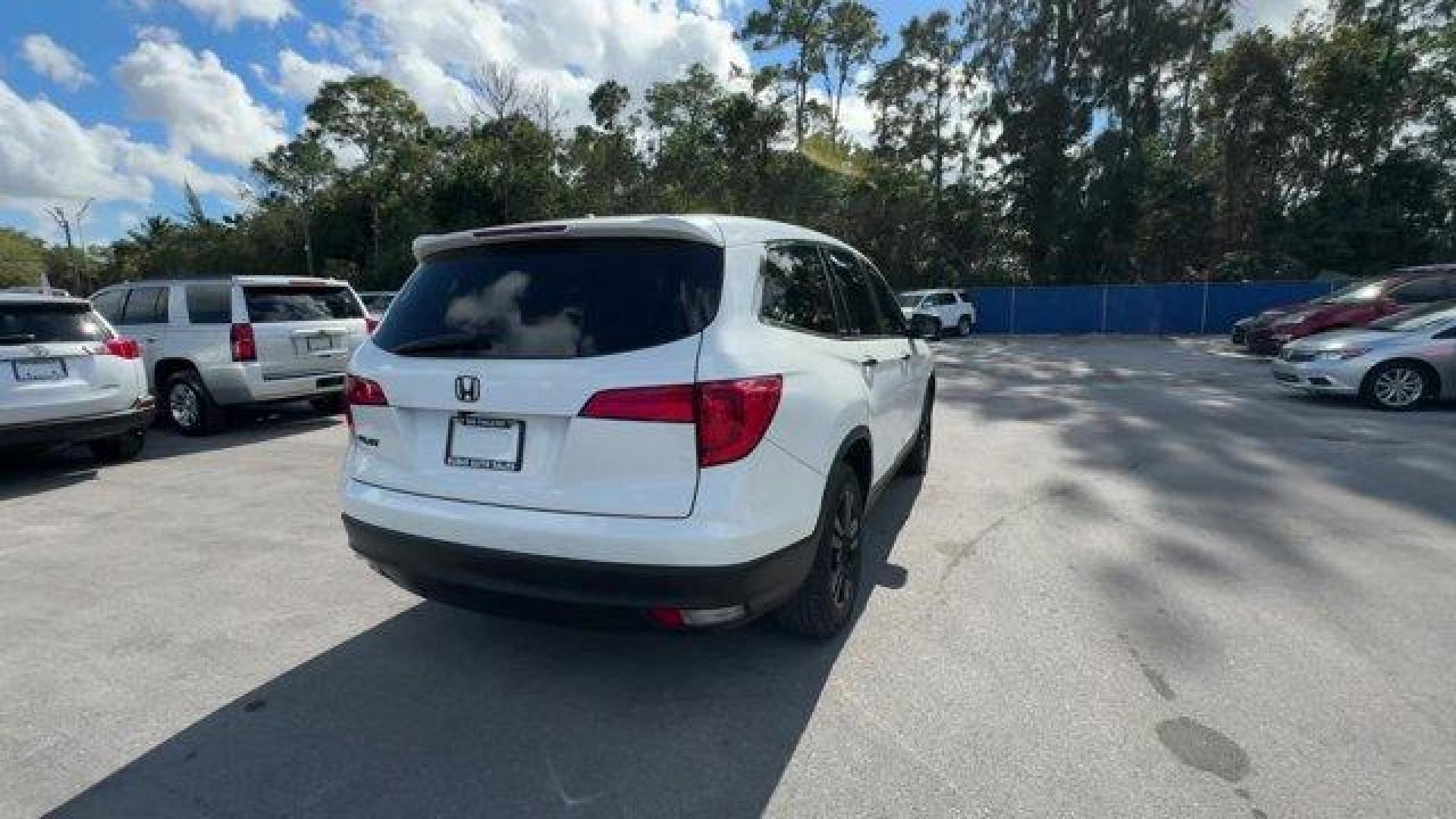 2016 White Honda Pilot EX-L (5FNYF5H57GB) with an 6 3.5 L engine, Automatic transmission, located at 27610 S Dixie Hwy, Homestead, FL, 33032, (305) 749-2348, 25.510241, -80.438301 - ALG Residual Value Awards, Residual Value Awards. Boasts 27 Highway MPG and 19 City MPG! This Honda Pilot boasts a Regular Unleaded V-6 3.5 L/212 engine powering this Automatic transmission. Window Grid Antenna, Wheels: 18 Alloy, Wheels w/Machined Accents.*This Honda Pilot Comes Equipped with These - Photo#4