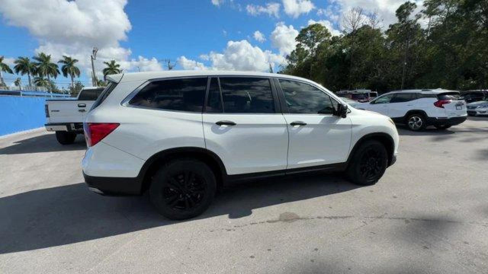 2016 White Honda Pilot EX-L (5FNYF5H57GB) with an 6 3.5 L engine, Automatic transmission, located at 27610 S Dixie Hwy, Homestead, FL, 33032, (305) 749-2348, 25.510241, -80.438301 - ALG Residual Value Awards, Residual Value Awards. Boasts 27 Highway MPG and 19 City MPG! This Honda Pilot boasts a Regular Unleaded V-6 3.5 L/212 engine powering this Automatic transmission. Window Grid Antenna, Wheels: 18 Alloy, Wheels w/Machined Accents.*This Honda Pilot Comes Equipped with These - Photo#5