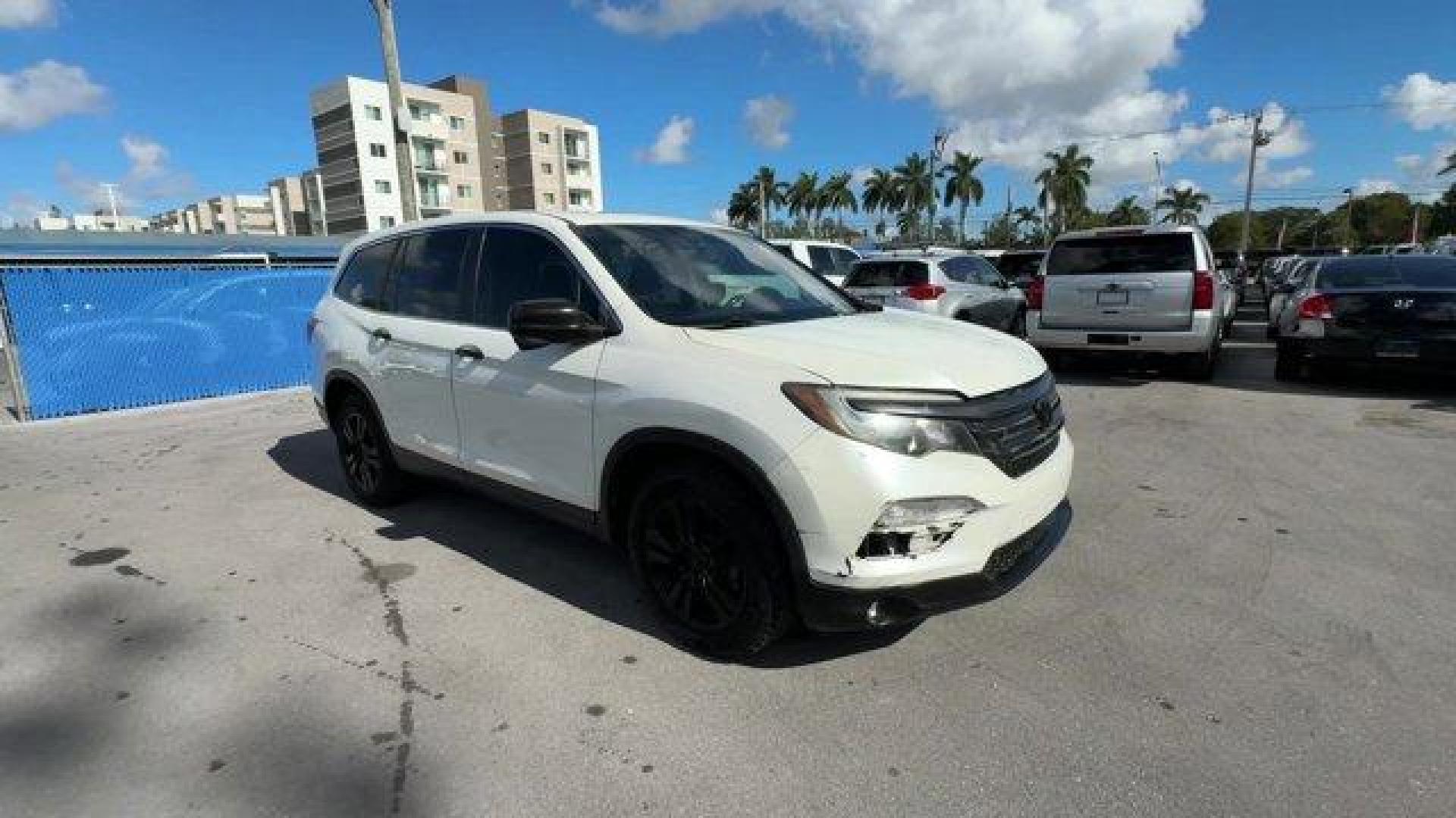 2016 White Honda Pilot EX-L (5FNYF5H57GB) with an 6 3.5 L engine, Automatic transmission, located at 27610 S Dixie Hwy, Homestead, FL, 33032, (305) 749-2348, 25.510241, -80.438301 - ALG Residual Value Awards, Residual Value Awards. Boasts 27 Highway MPG and 19 City MPG! This Honda Pilot boasts a Regular Unleaded V-6 3.5 L/212 engine powering this Automatic transmission. Window Grid Antenna, Wheels: 18 Alloy, Wheels w/Machined Accents.*This Honda Pilot Comes Equipped with These - Photo#6