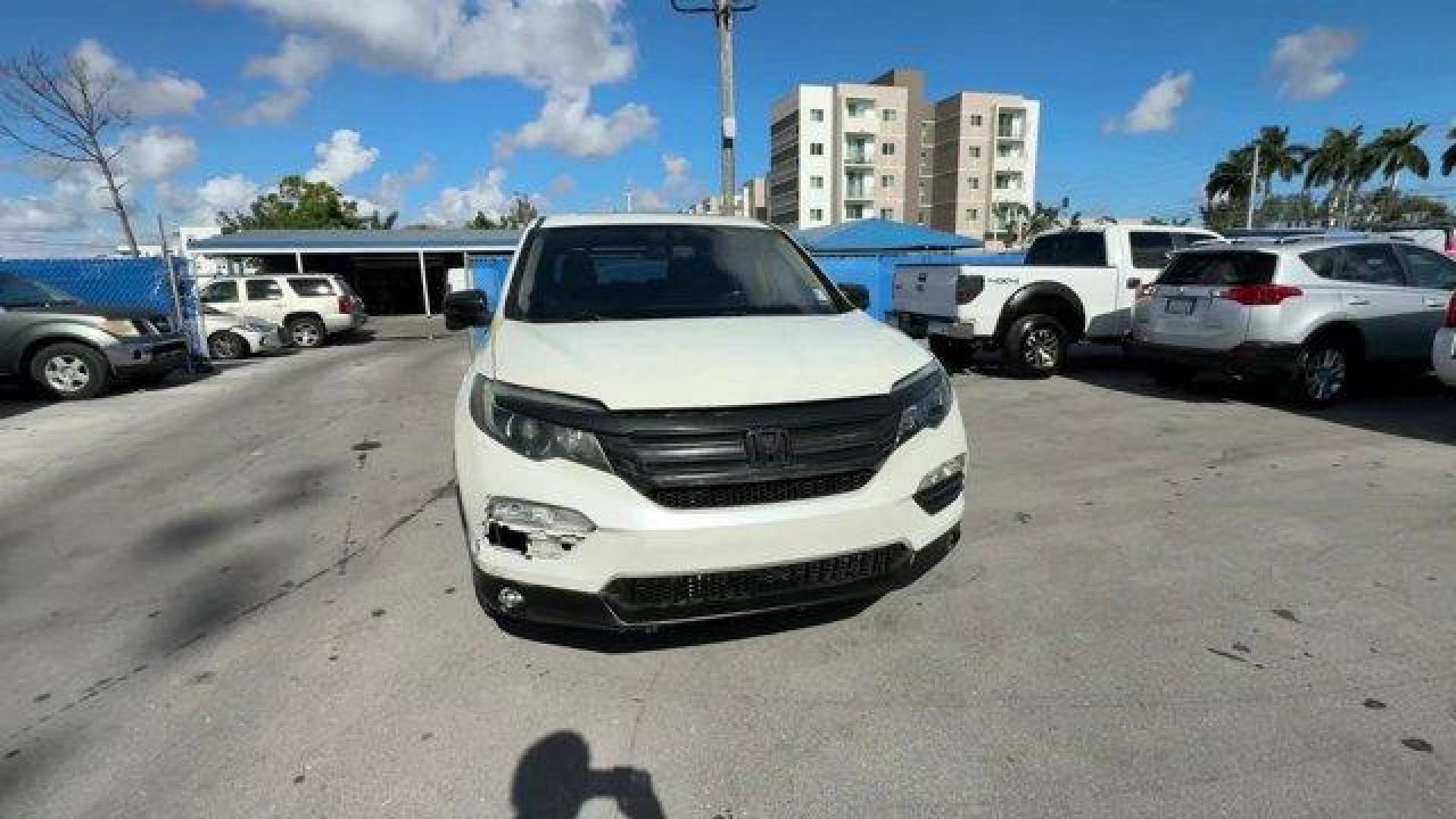 2016 White Honda Pilot EX-L (5FNYF5H57GB) with an 6 3.5 L engine, Automatic transmission, located at 27610 S Dixie Hwy, Homestead, FL, 33032, (305) 749-2348, 25.510241, -80.438301 - ALG Residual Value Awards, Residual Value Awards. Boasts 27 Highway MPG and 19 City MPG! This Honda Pilot boasts a Regular Unleaded V-6 3.5 L/212 engine powering this Automatic transmission. Window Grid Antenna, Wheels: 18 Alloy, Wheels w/Machined Accents.*This Honda Pilot Comes Equipped with These - Photo#7
