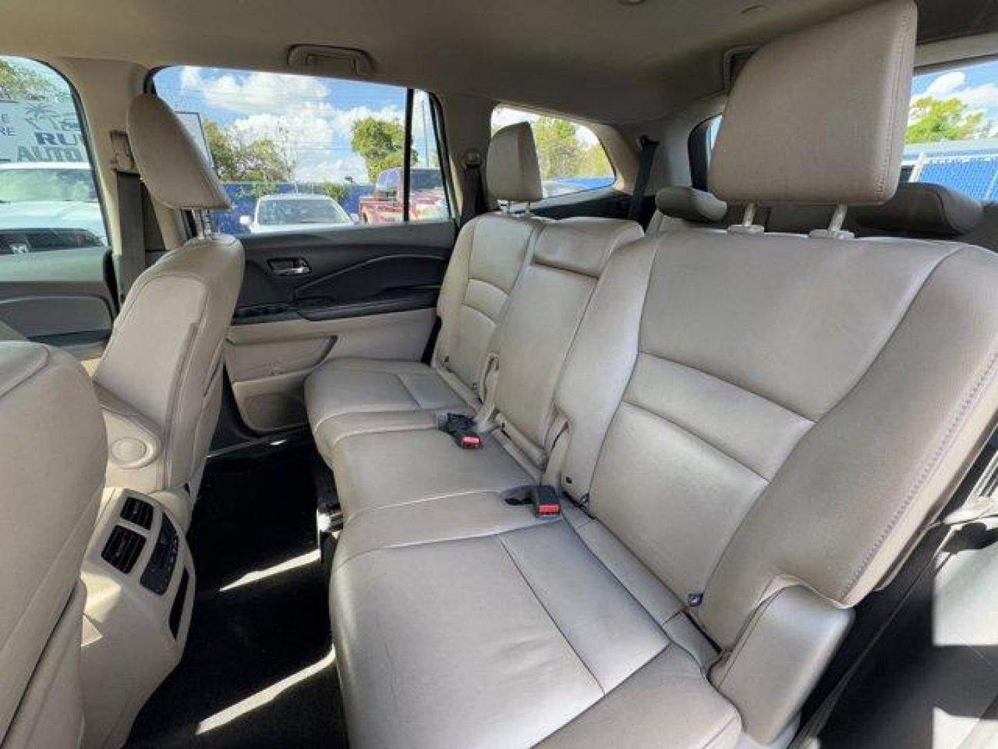 2016 White Honda Pilot EX-L (5FNYF5H57GB) with an 6 3.5 L engine, Automatic transmission, located at 27610 S Dixie Hwy, Homestead, FL, 33032, (305) 749-2348, 25.510241, -80.438301 - ALG Residual Value Awards, Residual Value Awards. Boasts 27 Highway MPG and 19 City MPG! This Honda Pilot boasts a Regular Unleaded V-6 3.5 L/212 engine powering this Automatic transmission. Window Grid Antenna, Wheels: 18 Alloy, Wheels w/Machined Accents.*This Honda Pilot Comes Equipped with These - Photo#12