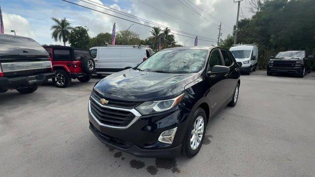2020 Midnight Blue Metallic /Medium Ash Gray Chevrolet Equinox LS (2GNAXHEVXL6) with an 4 1.5L engine, Automatic transmission, located at 27610 S Dixie Hwy, Homestead, FL, 33032, (305) 749-2348, 25.510241, -80.438301 - IIHS Top Safety Pick with specific headlights. Delivers 31 Highway MPG and 26 City MPG! This Chevrolet Equinox boasts a Turbocharged Gas I4 1.5L/92 engine powering this Automatic transmission. WHEELS, 17 (43.2 CM) ALUMINUM (STD), TRANSMISSION, 6-SPEED AUTOMATIC, ELECTRONICALLY-CONTROLLED WITH OVERDR - Photo#0