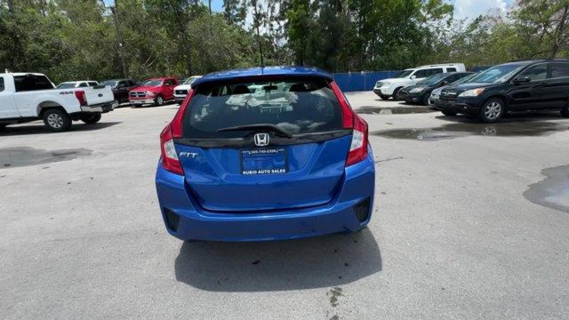 2015 Blue Honda Fit LX (3HGGK5H55FM) with an 4 1.5 L engine, Variable transmission, located at 27610 S Dixie Hwy, Homestead, FL, 33032, (305) 749-2348, 25.510241, -80.438301 - IIHS Top Safety Pick. Only 82,259 Miles! Delivers 41 Highway MPG and 33 City MPG! This Honda Fit delivers a Regular Unleaded I-4 1.5 L/91 engine powering this Variable transmission. VSA Electronic Stability Control (ESC), Urethane Gear Shifter Material, Trip Computer.*This Honda Fit Comes Equipped w - Photo#3