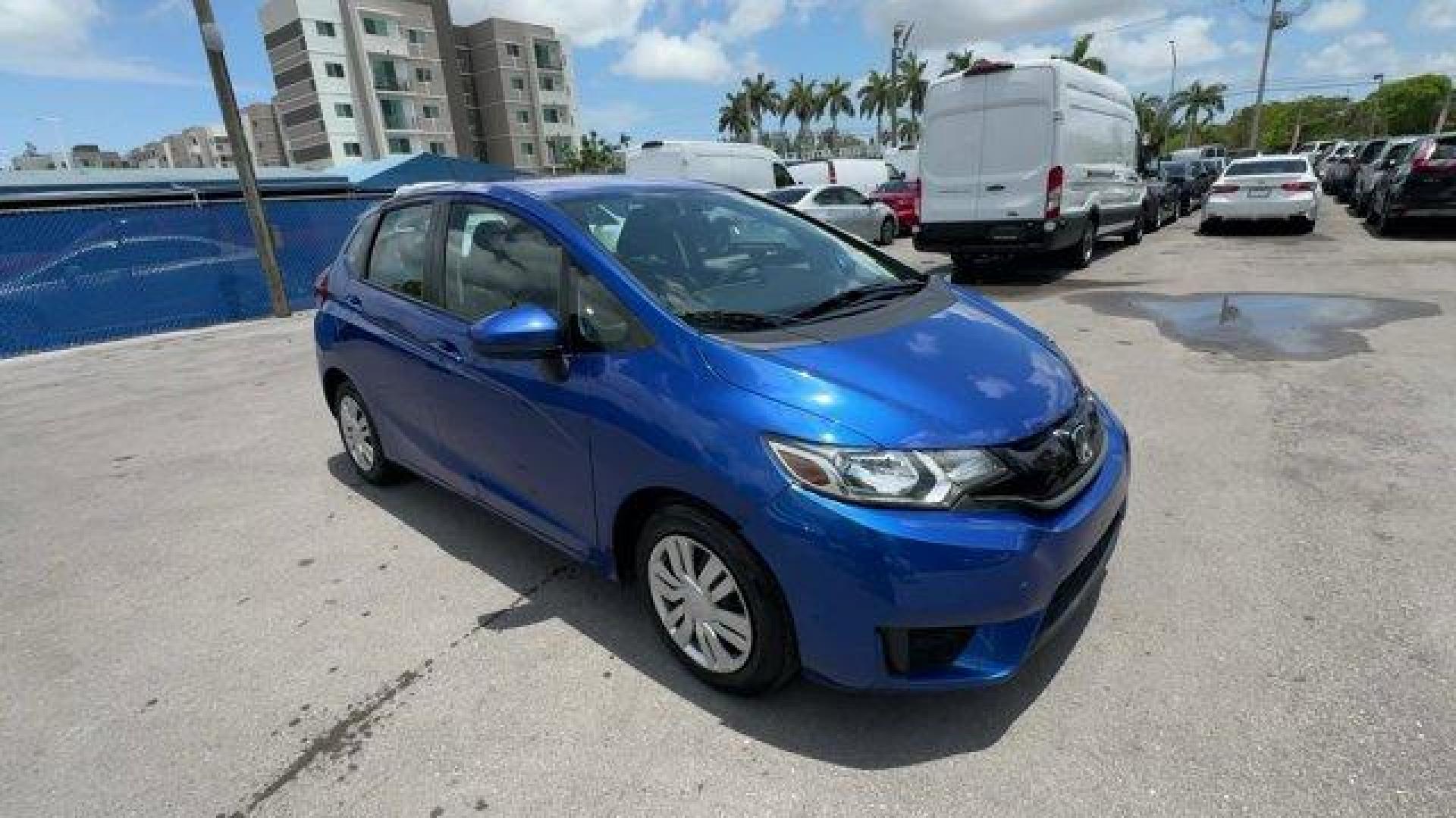 2015 Blue Honda Fit LX (3HGGK5H55FM) with an 4 1.5 L engine, Variable transmission, located at 27610 S Dixie Hwy, Homestead, FL, 33032, (305) 749-2348, 25.510241, -80.438301 - IIHS Top Safety Pick. Only 82,259 Miles! Delivers 41 Highway MPG and 33 City MPG! This Honda Fit delivers a Regular Unleaded I-4 1.5 L/91 engine powering this Variable transmission. VSA Electronic Stability Control (ESC), Urethane Gear Shifter Material, Trip Computer.*This Honda Fit Comes Equipped w - Photo#6