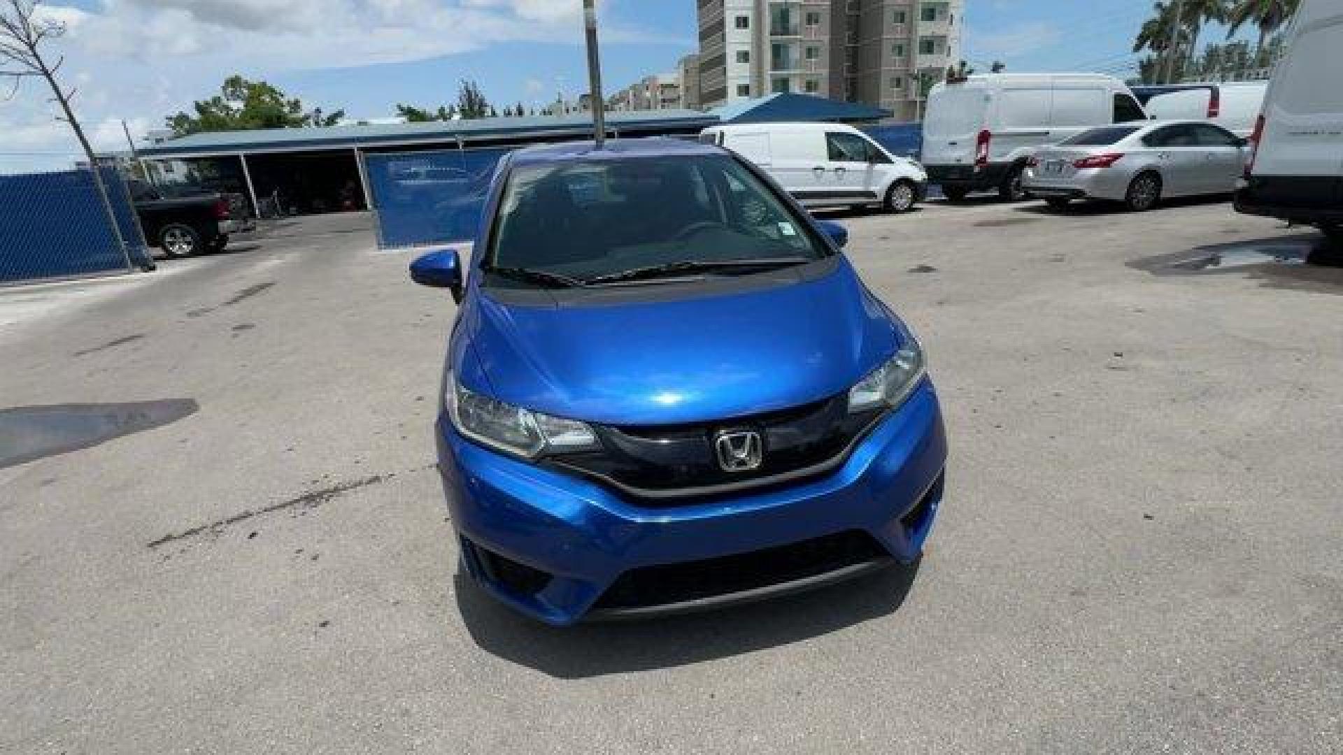 2015 Blue Honda Fit LX (3HGGK5H55FM) with an 4 1.5 L engine, Variable transmission, located at 27610 S Dixie Hwy, Homestead, FL, 33032, (305) 749-2348, 25.510241, -80.438301 - IIHS Top Safety Pick. Only 82,259 Miles! Delivers 41 Highway MPG and 33 City MPG! This Honda Fit delivers a Regular Unleaded I-4 1.5 L/91 engine powering this Variable transmission. VSA Electronic Stability Control (ESC), Urethane Gear Shifter Material, Trip Computer.*This Honda Fit Comes Equipped w - Photo#7