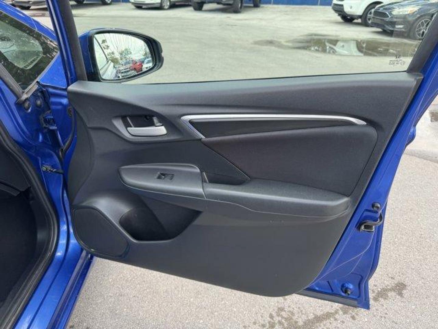 2015 Blue Honda Fit LX (3HGGK5H55FM) with an 4 1.5 L engine, Variable transmission, located at 27610 S Dixie Hwy, Homestead, FL, 33032, (305) 749-2348, 25.510241, -80.438301 - IIHS Top Safety Pick. Only 82,259 Miles! Delivers 41 Highway MPG and 33 City MPG! This Honda Fit delivers a Regular Unleaded I-4 1.5 L/91 engine powering this Variable transmission. VSA Electronic Stability Control (ESC), Urethane Gear Shifter Material, Trip Computer.*This Honda Fit Comes Equipped w - Photo#15