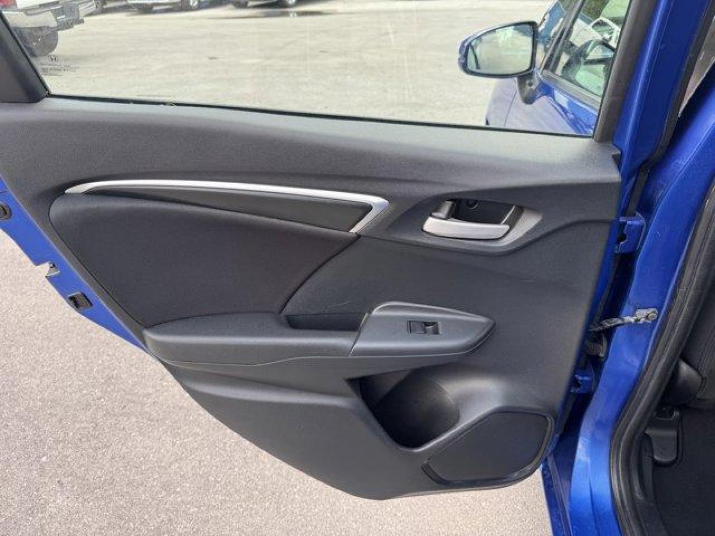 2015 Blue Honda Fit LX (3HGGK5H55FM) with an 4 1.5 L engine, Variable transmission, located at 27610 S Dixie Hwy, Homestead, FL, 33032, (305) 749-2348, 25.510241, -80.438301 - IIHS Top Safety Pick. Only 82,259 Miles! Delivers 41 Highway MPG and 33 City MPG! This Honda Fit delivers a Regular Unleaded I-4 1.5 L/91 engine powering this Variable transmission. VSA Electronic Stability Control (ESC), Urethane Gear Shifter Material, Trip Computer.*This Honda Fit Comes Equipped w - Photo#16