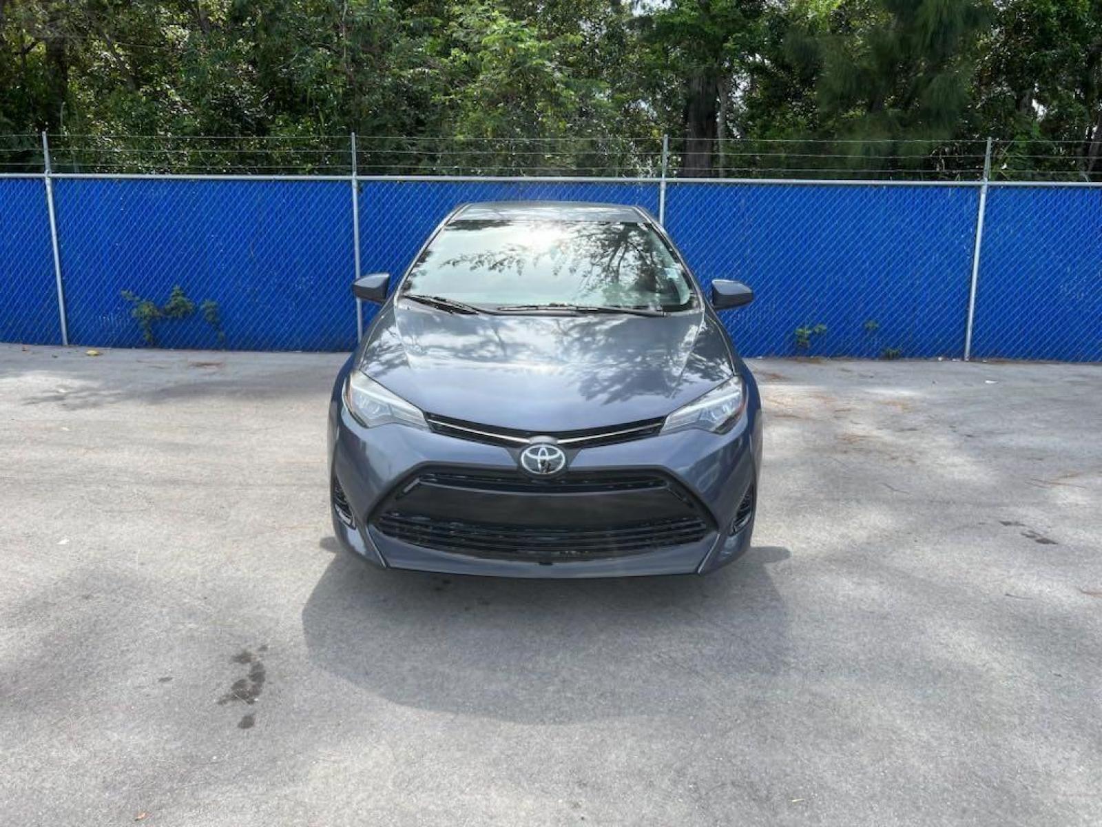 2019 Slate Metallic /Black Toyota Corolla L (5YFBURHE1KP) with an 1.8L I4 DOHC engine, CVT transmission, located at 27610 S Dixie Hwy, Homestead, FL, 33032, (305) 749-2348, 25.510241, -80.438301 - Photo #0