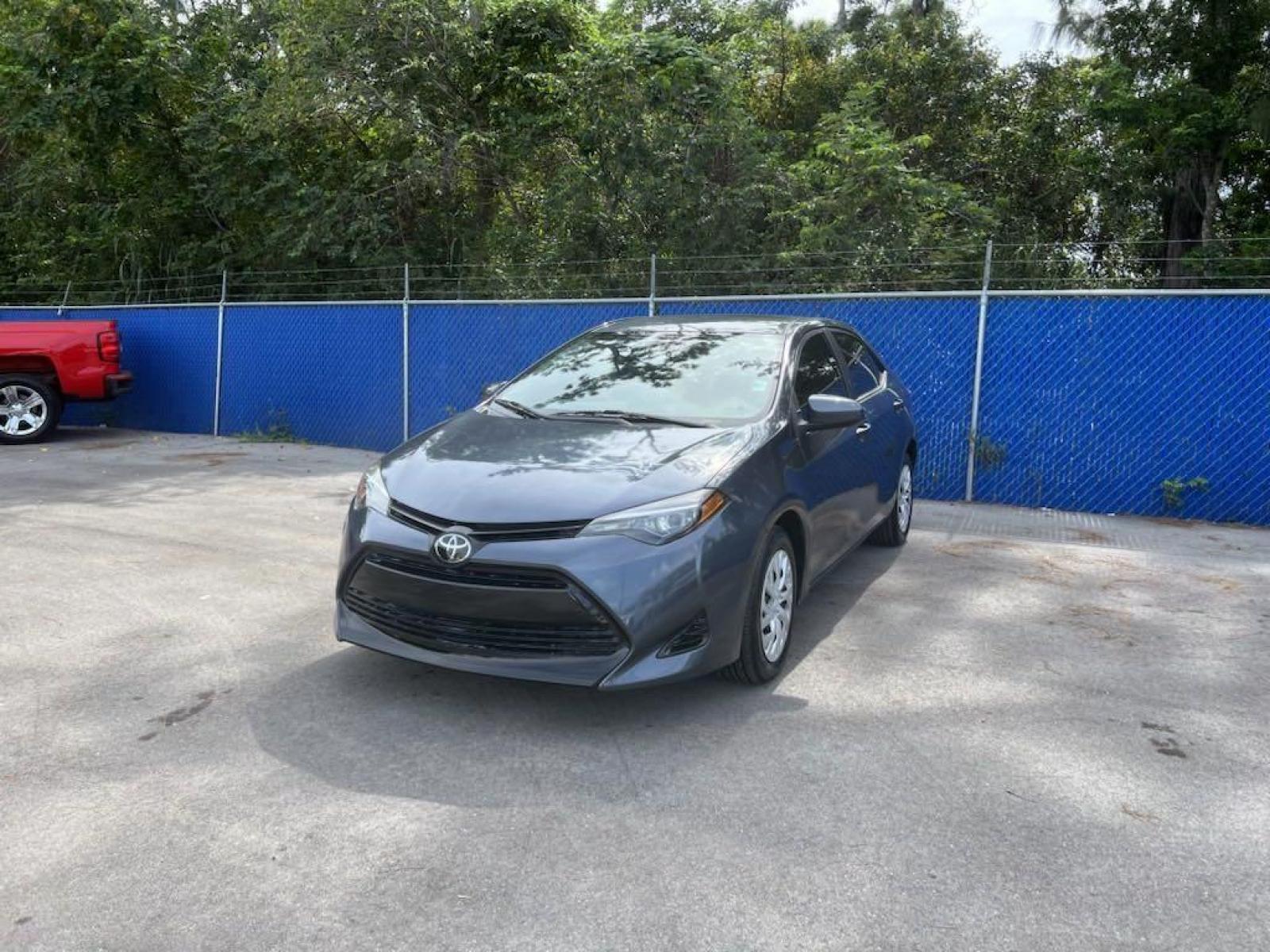 2019 Slate Metallic /Black Toyota Corolla L (5YFBURHE1KP) with an 1.8L I4 DOHC engine, CVT transmission, located at 27610 S Dixie Hwy, Homestead, FL, 33032, (305) 749-2348, 25.510241, -80.438301 - Photo #2