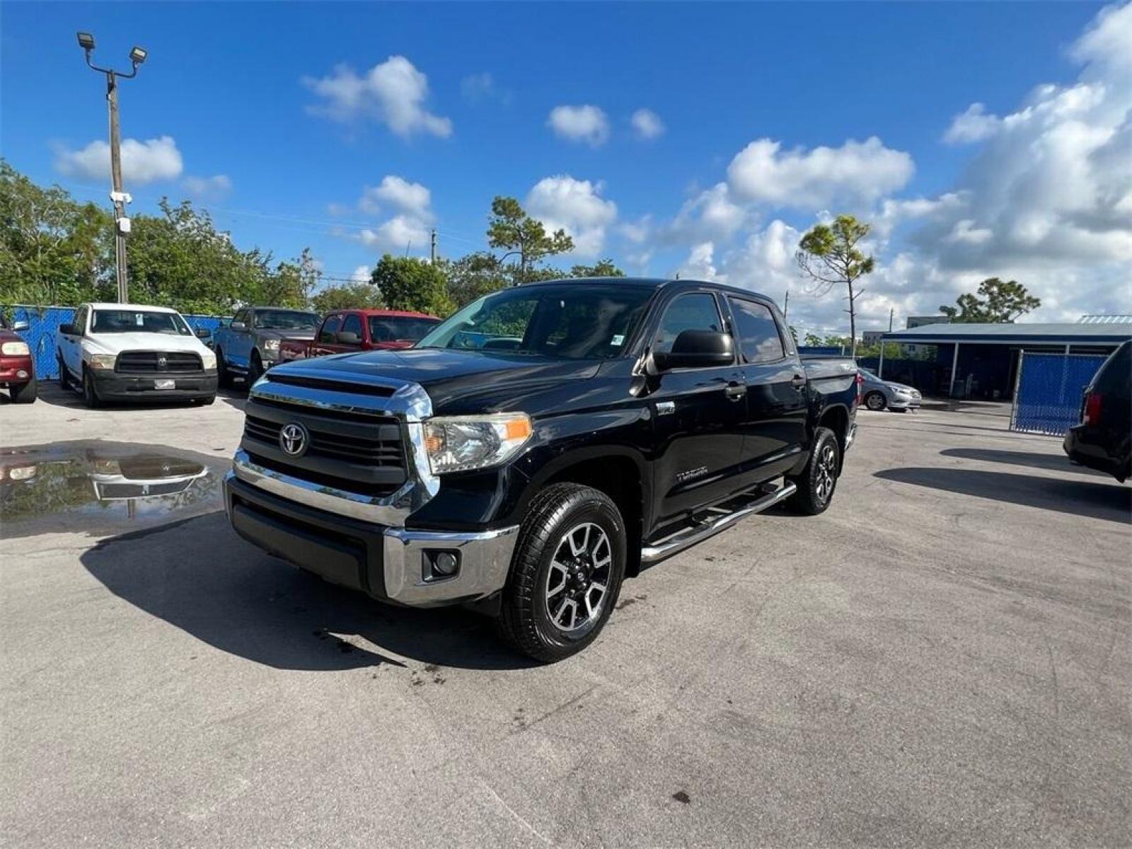 2014 Black Toyota Tundra SR5 (5TFDY5F13EX) with an i-Force 5.7L V8 DOHC 32V LEV engine, Automatic transmission, located at 27610 S Dixie Hwy, Homestead, FL, 33032, (305) 749-2348, 25.510241, -80.438301 - Photo #1