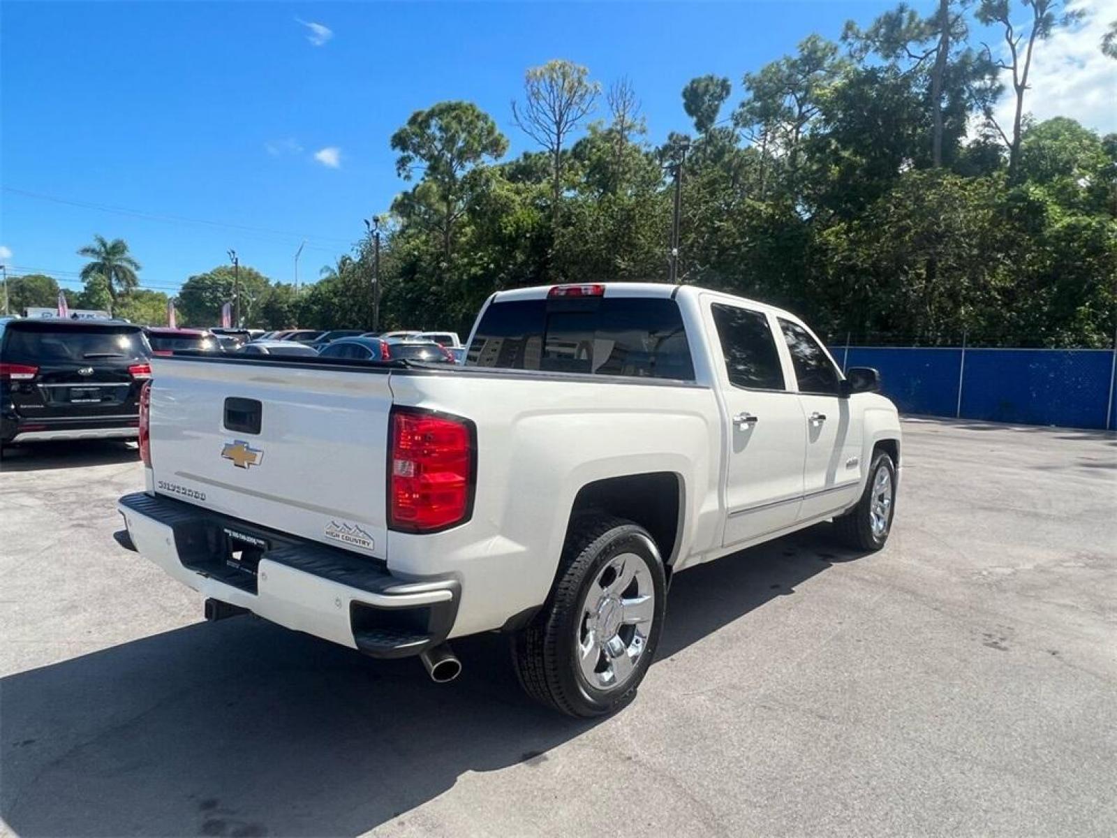 2015 White Diamond Tricoat /Saddle Chevrolet Silverado 1500 High Country (3GCPCTEC7FG) with an EcoTec3 5.3L V8 engine, Automatic transmission, located at 27610 S Dixie Hwy, Homestead, FL, 33032, (305) 749-2348, 25.510241, -80.438301 - Photo #2